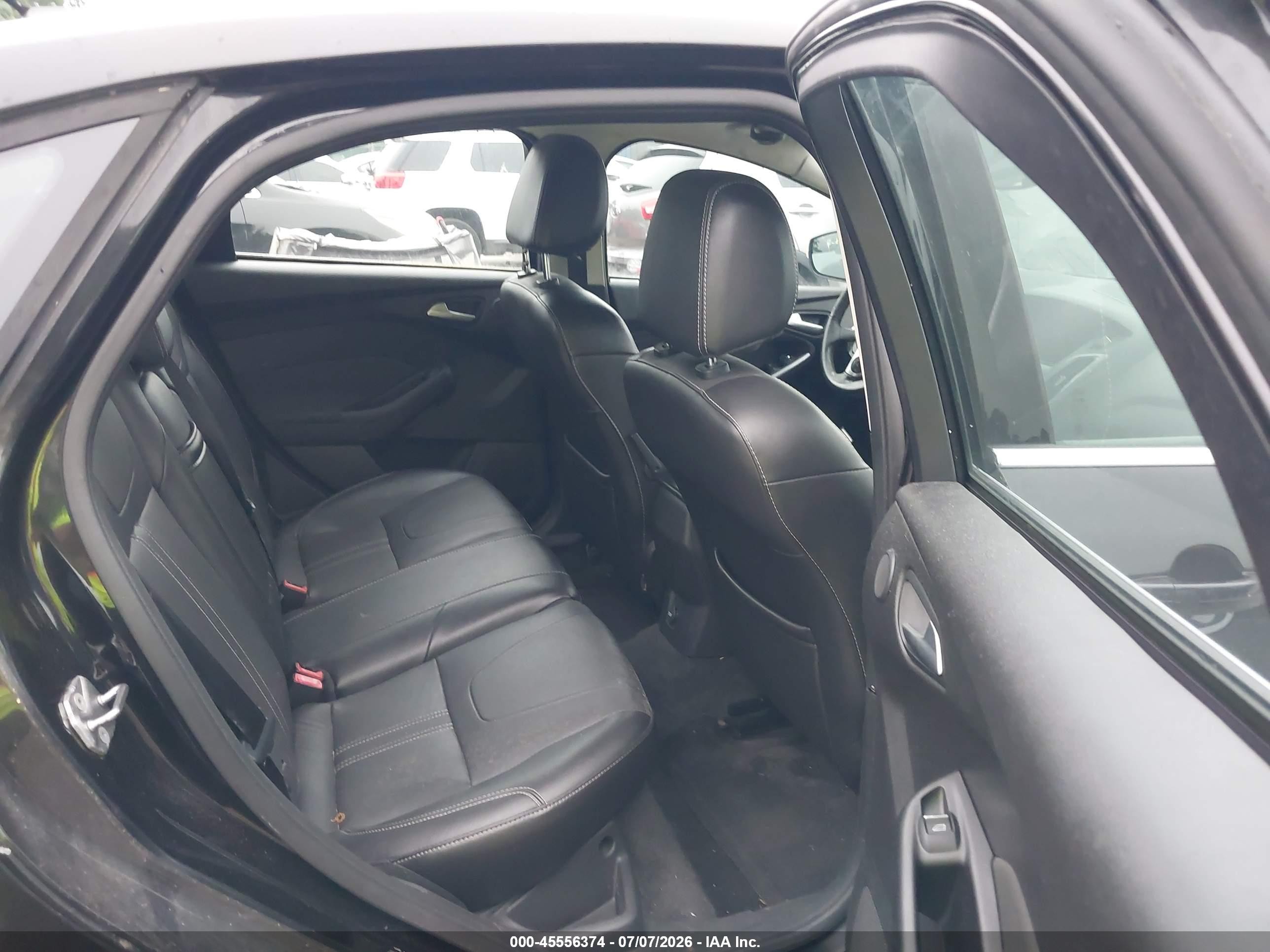 2012 Ford Focus Titanium Black vin: 1FAHP3J29CL390699