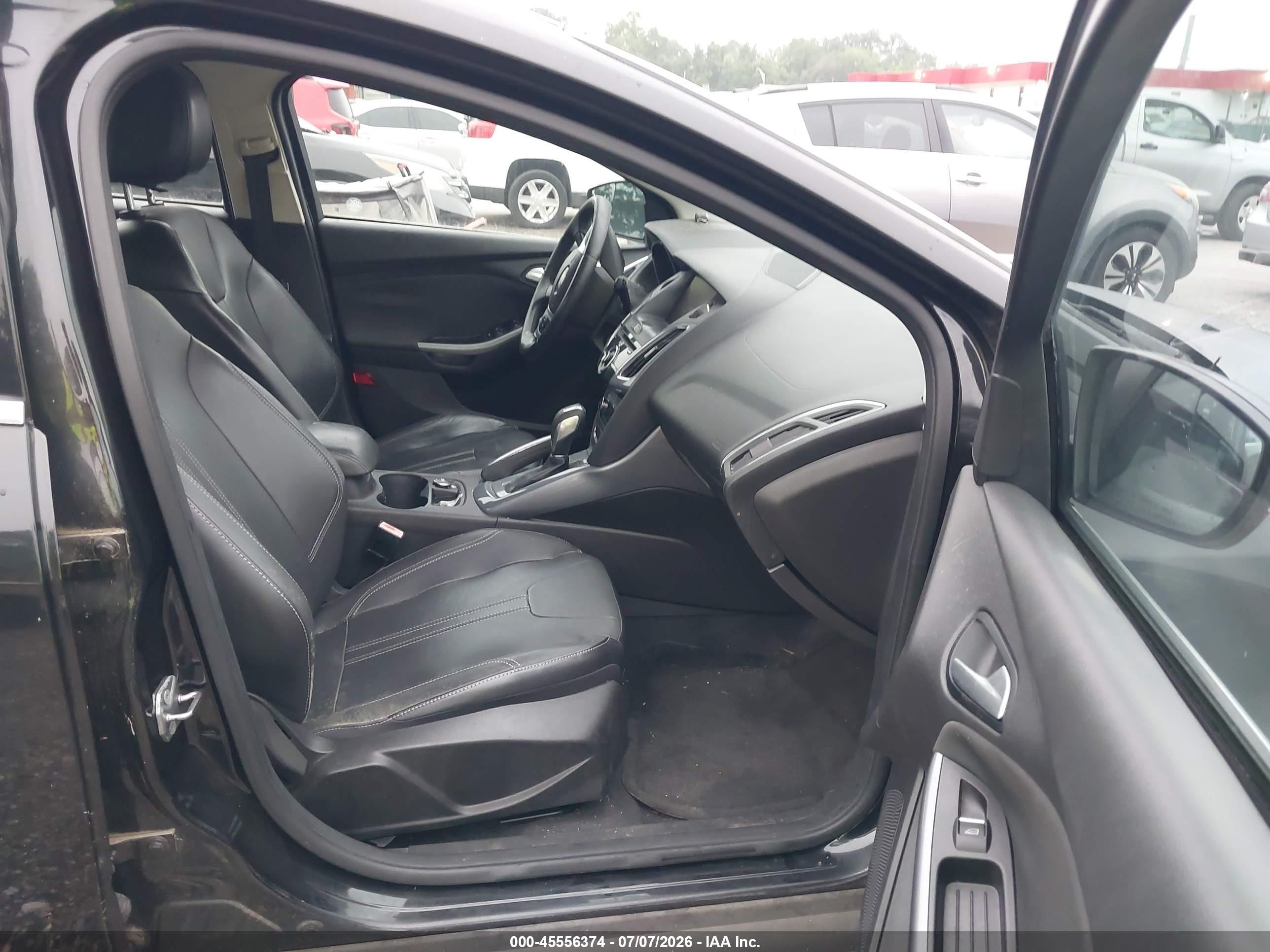 2012 Ford Focus Titanium Black vin: 1FAHP3J29CL390699