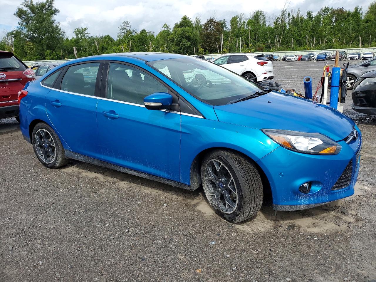 2012 Ford Focus Titanium Blue vin: 1FAHP3J2XCL390615