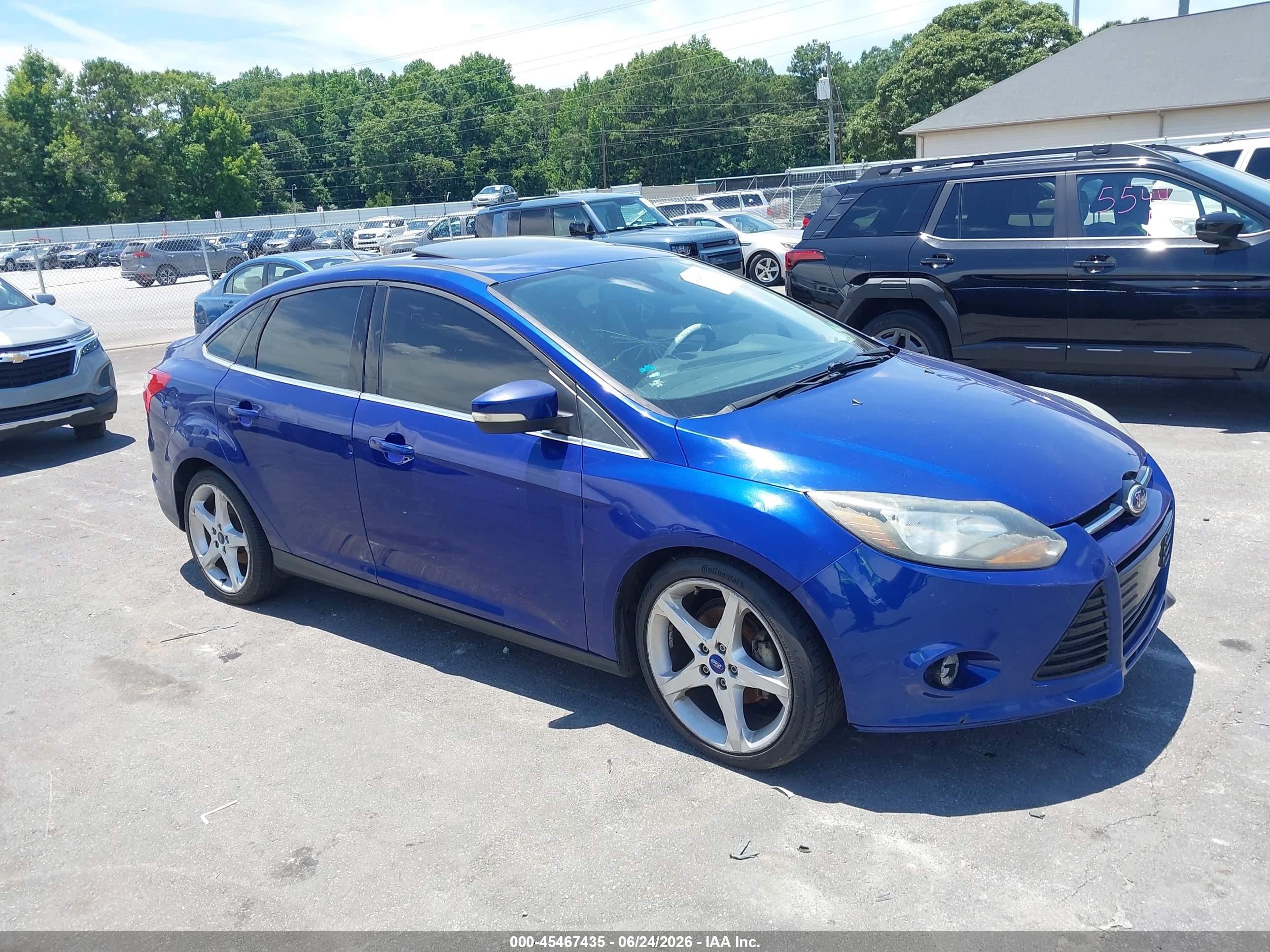 2012 Ford Focus Titanium Blue vin: 1FAHP3J2XCL443099
