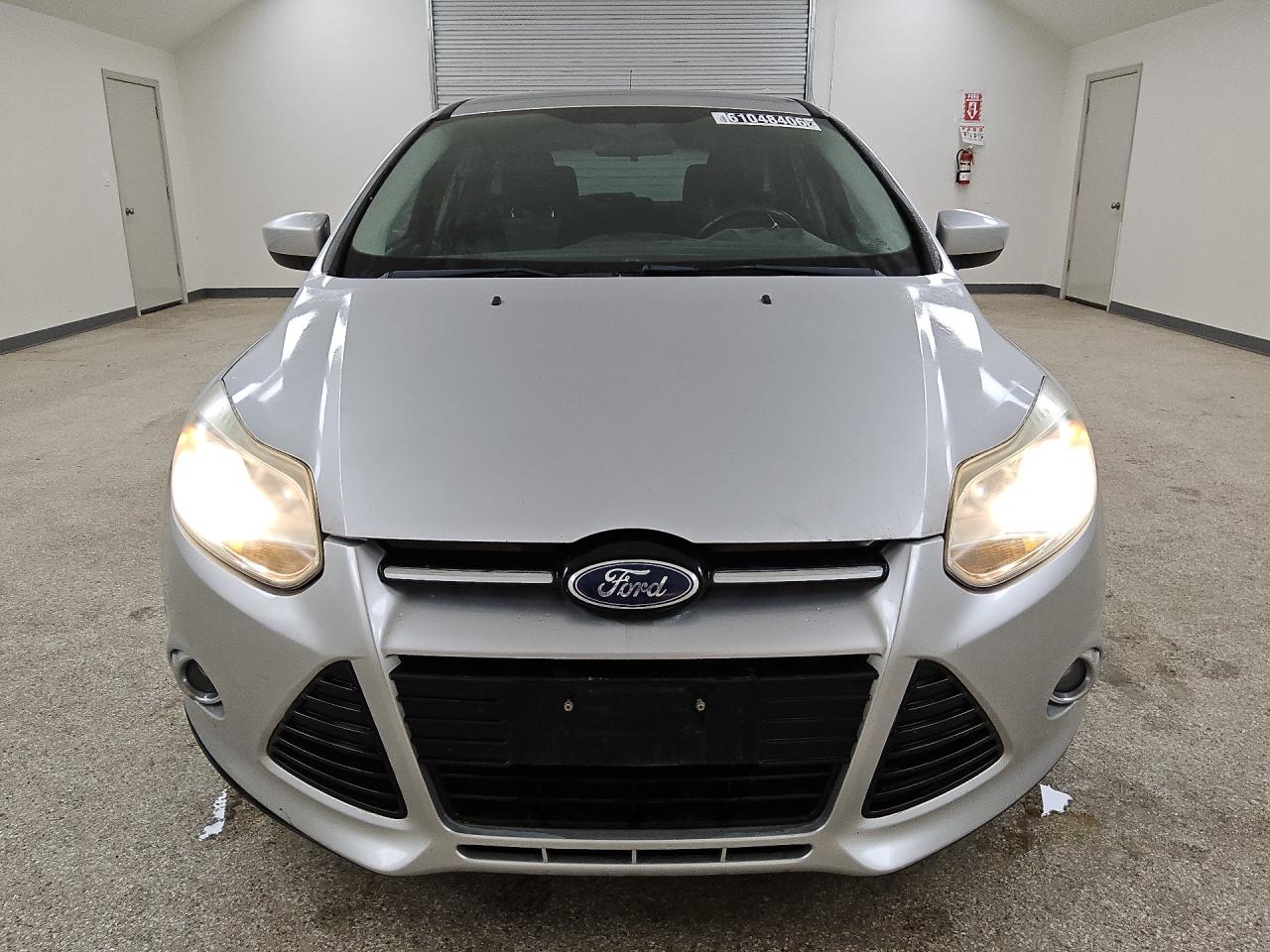 2012 Ford Focus Se Silver vin: 1FAHP3K28CL321565 Damage: Front Bumper, Heavy Scratch, 2 To 3 Inches