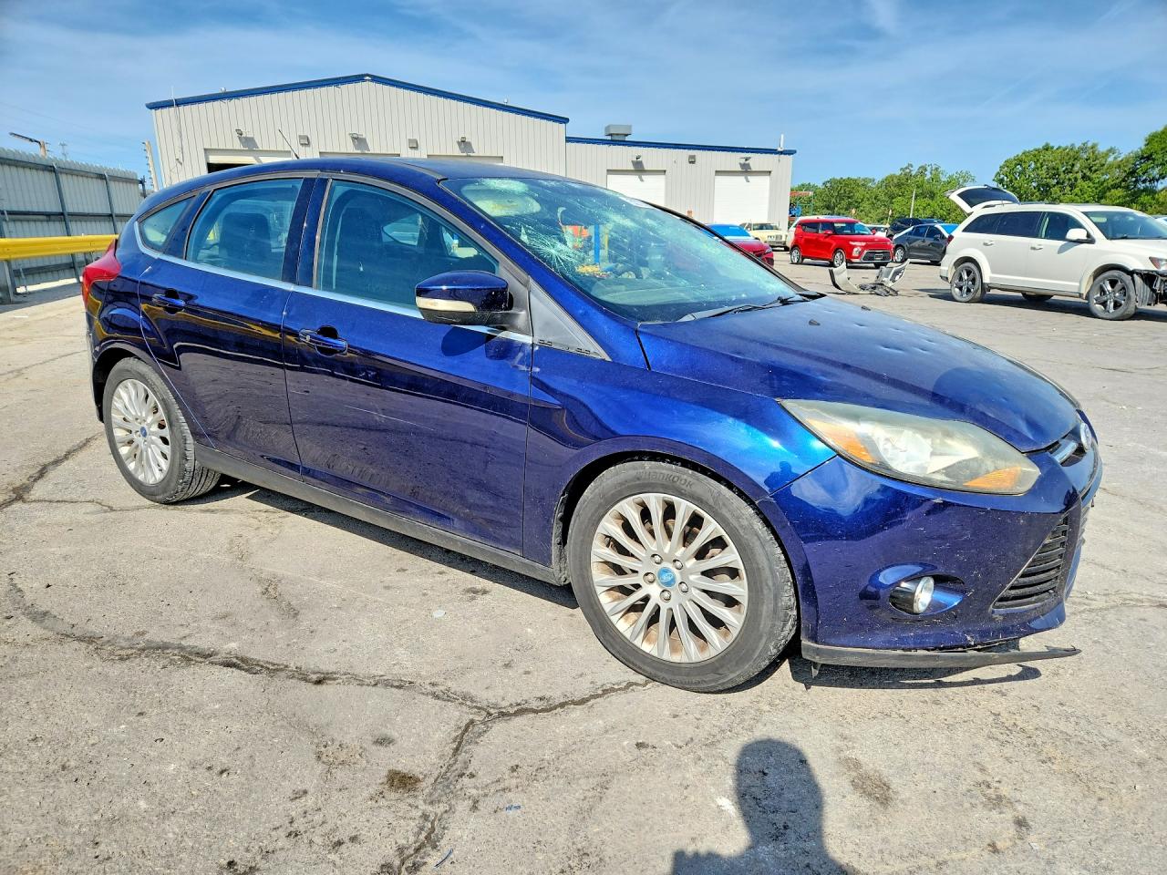 2012 Ford Focus Titanium Blue vin: 1FAHP3N20CL102434
