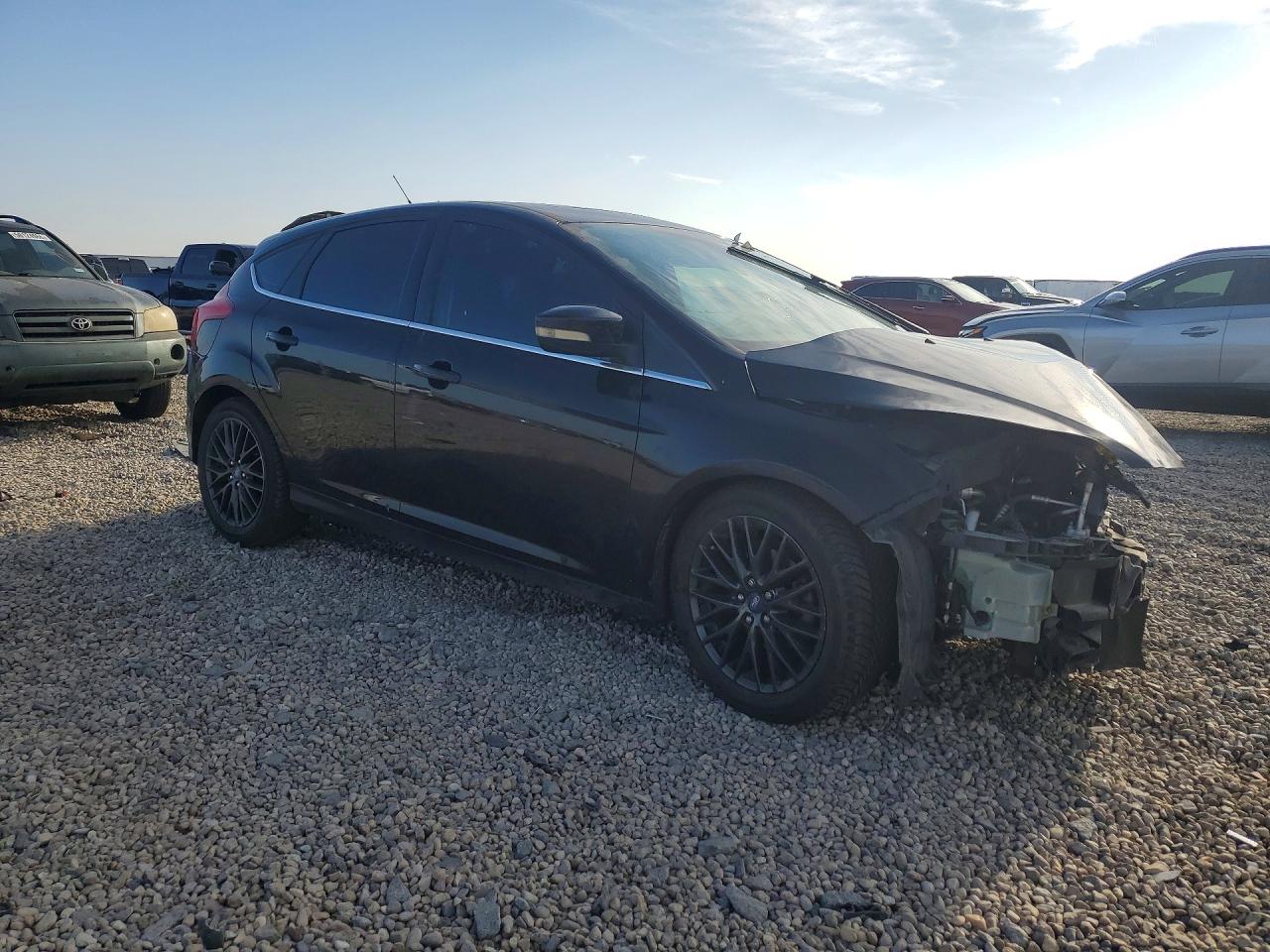 2012 Ford Focus Titanium Black vin: 1FAHP3N21CL262600