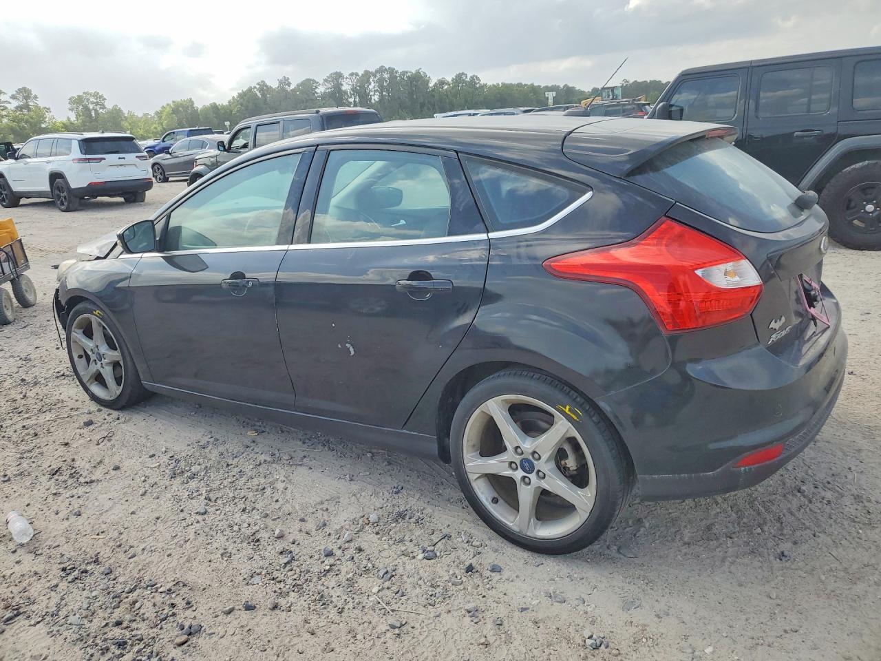 2012 Ford Focus Titanium Black vin: 1FAHP3N22CL428686