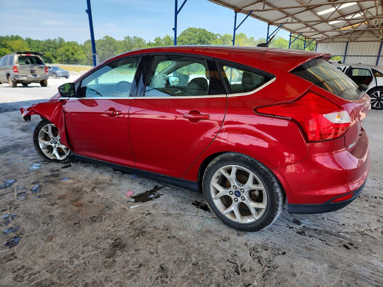 2012 Ford Focus Titanium Red vin: 1FAHP3N22CL461851