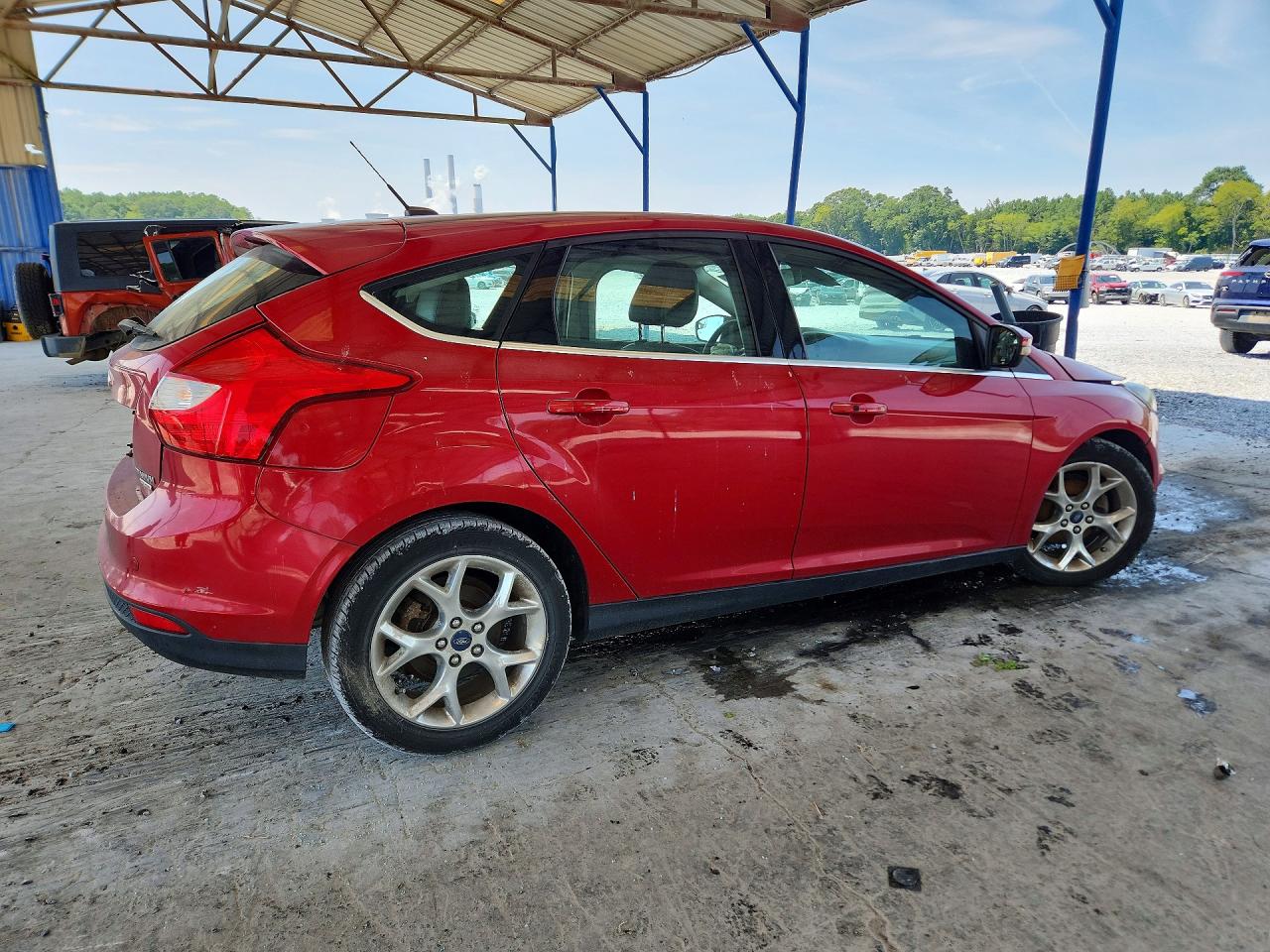 2012 Ford Focus Titanium Red vin: 1FAHP3N22CL461851