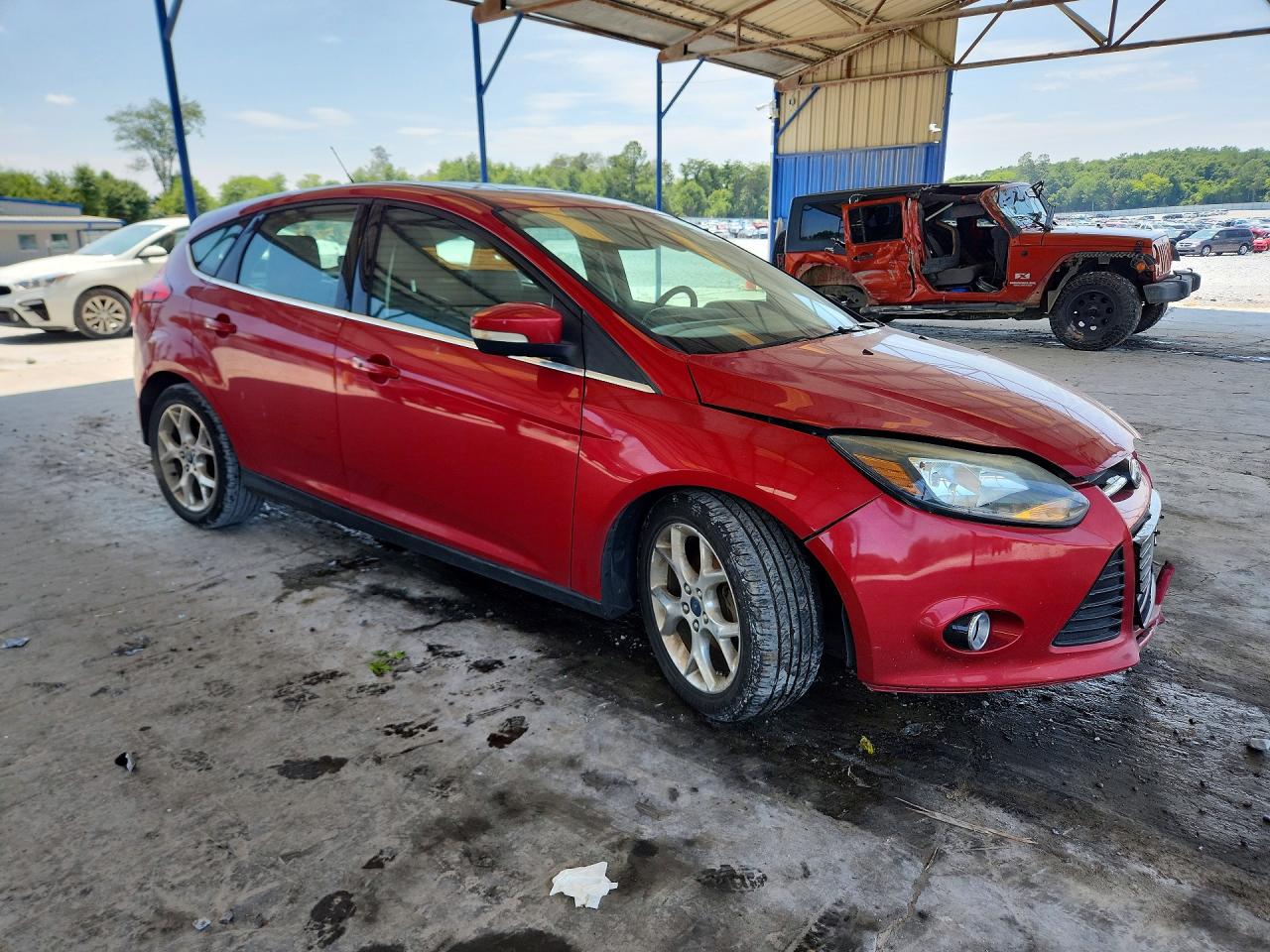 2012 Ford Focus Titanium Red vin: 1FAHP3N22CL461851