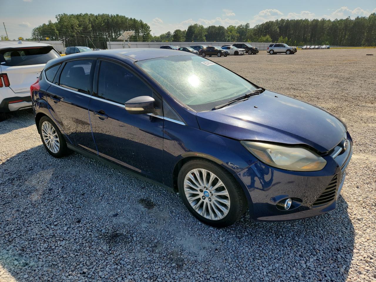 2012 Ford Focus Titanium Blue vin: 1FAHP3N24CL111024