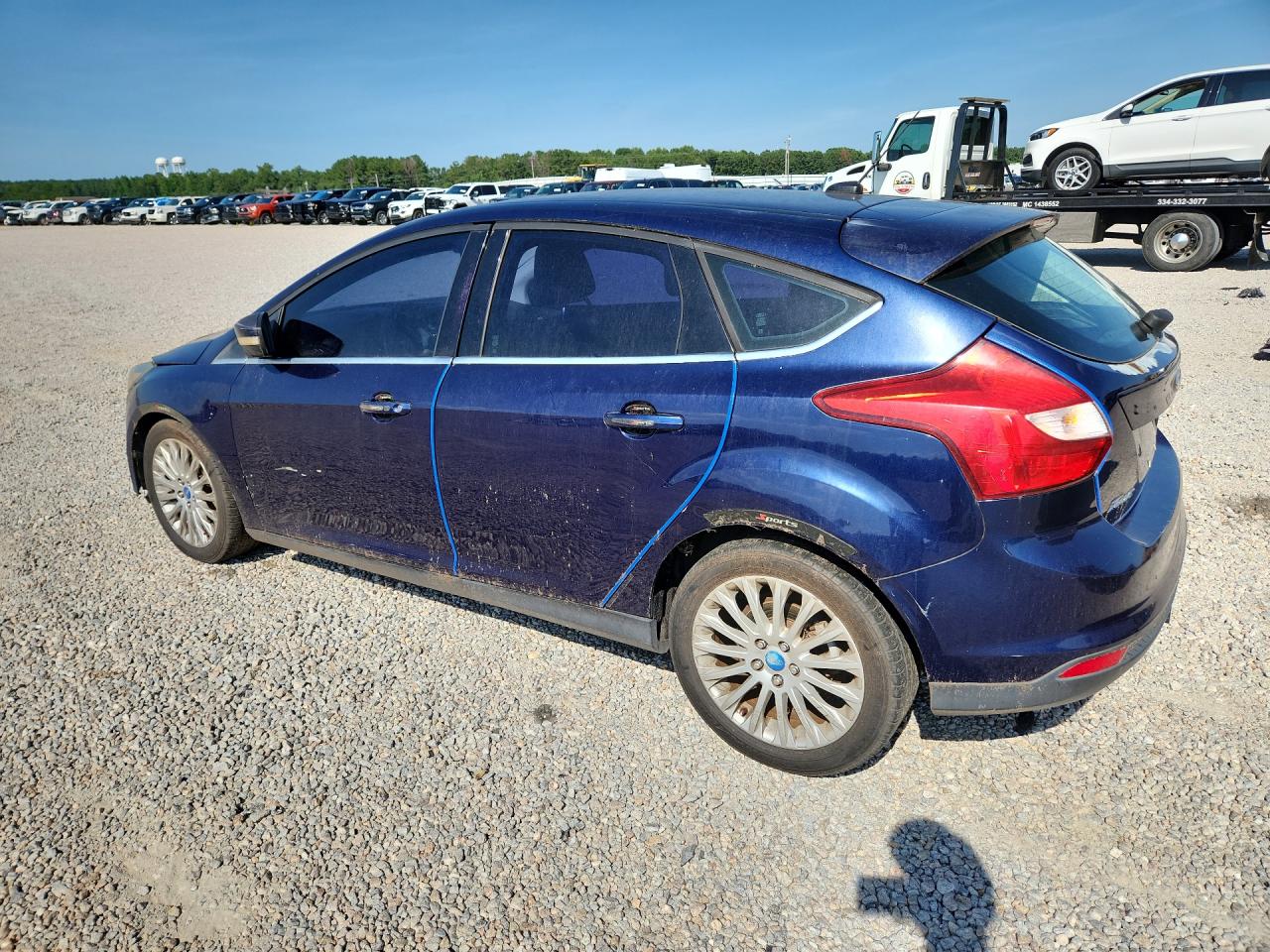 2012 Ford Focus Titanium Blue vin: 1FAHP3N24CL111024