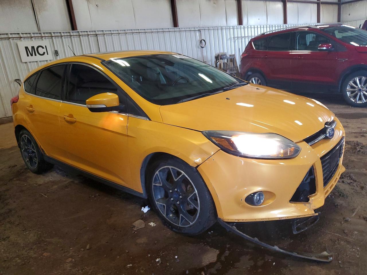 2012 Ford Focus Titanium Gold vin: 1FAHP3N25CL145313