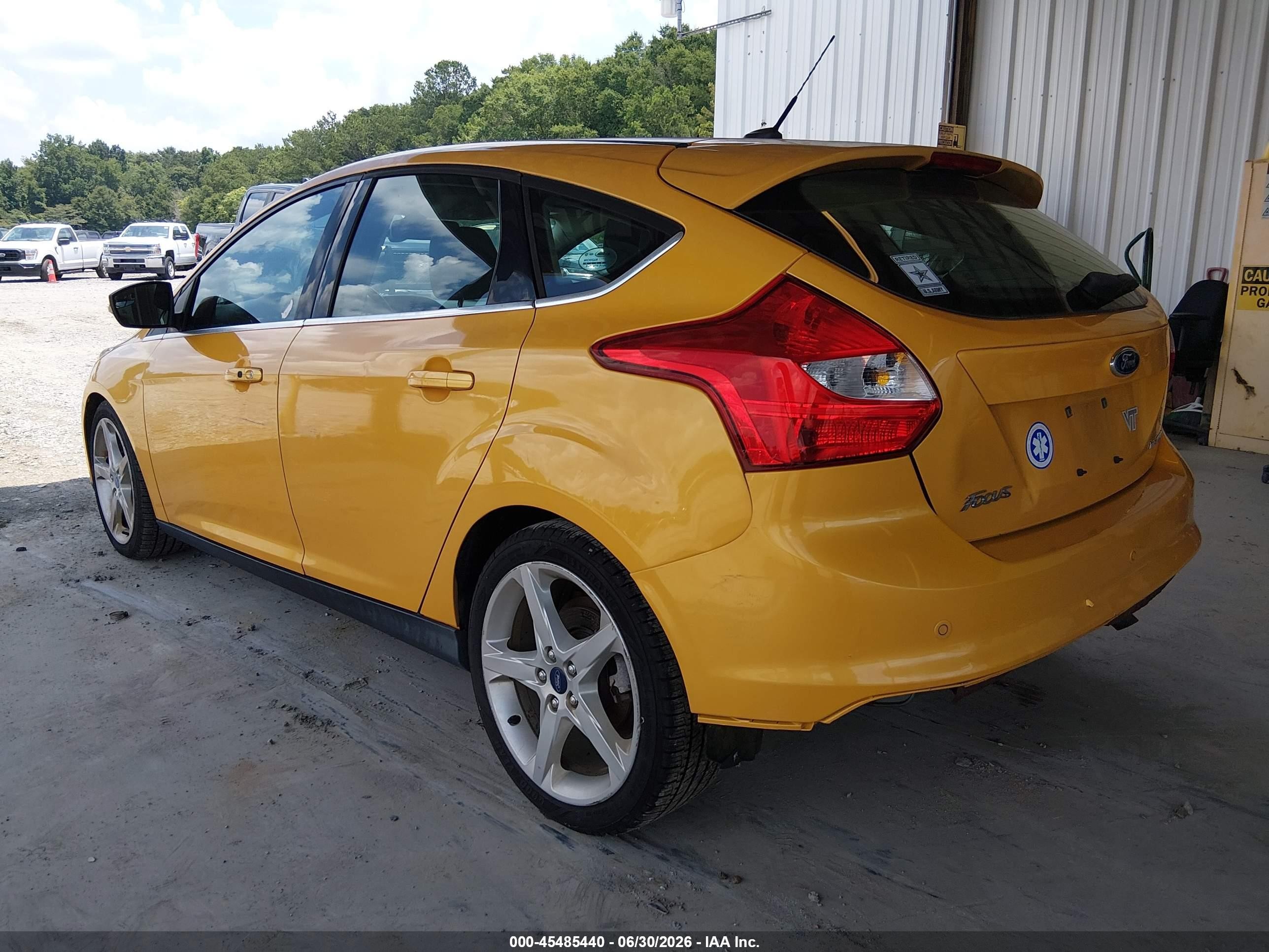 2012 Ford Focus Titanium Yellow vin: 1FAHP3N26CL323312