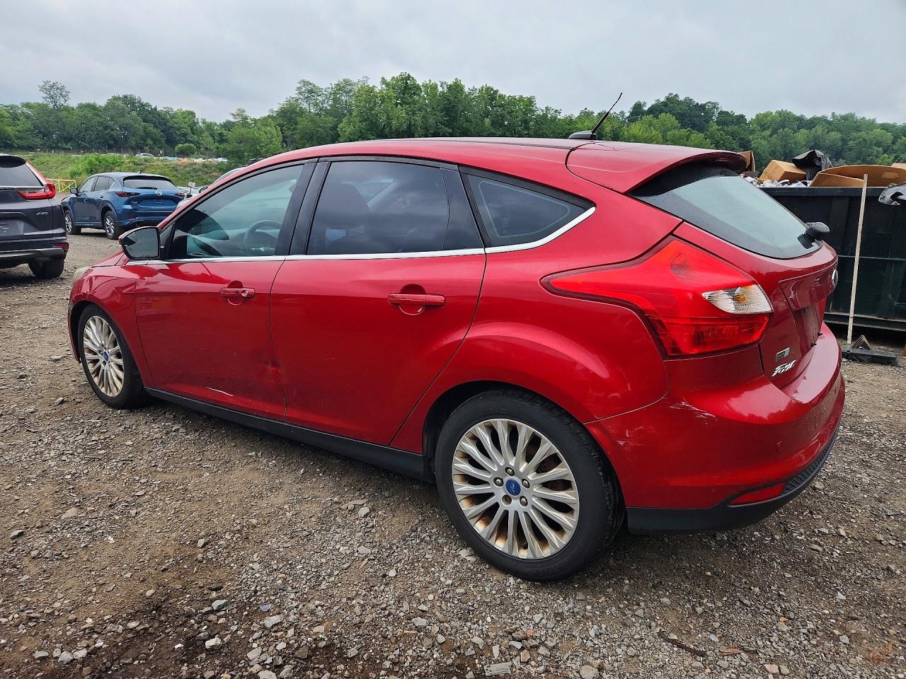 2012 Ford Focus Titanium Red vin: 1FAHP3N28CL253649