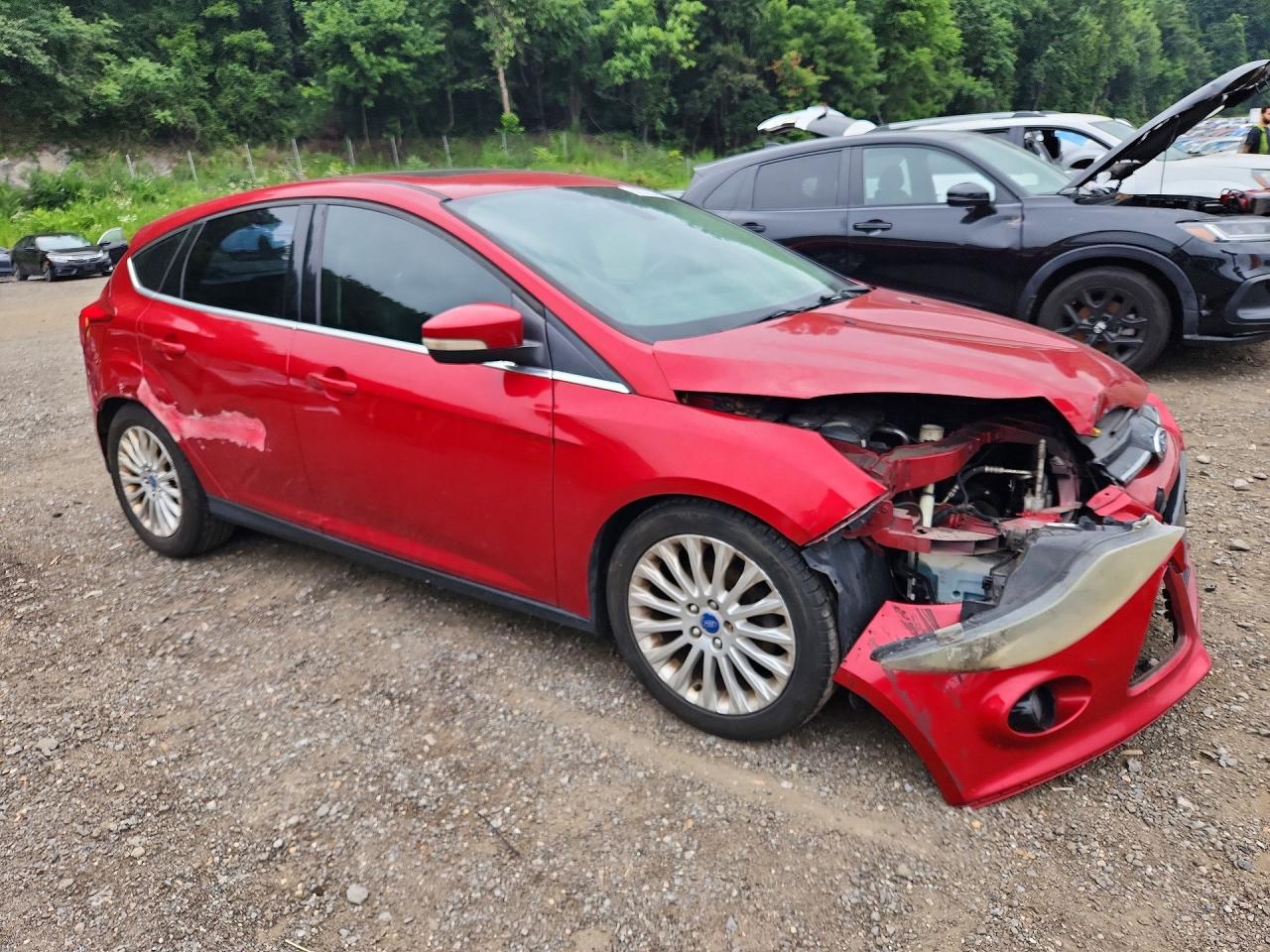 2012 Ford Focus Titanium Red vin: 1FAHP3N28CL253649