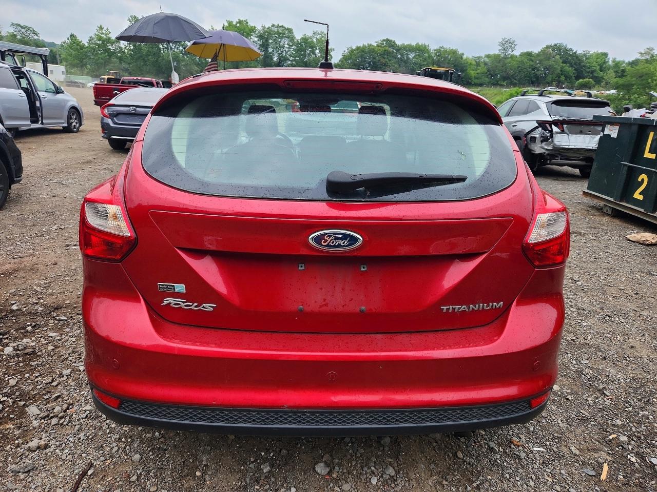 2012 Ford Focus Titanium Red vin: 1FAHP3N28CL253649