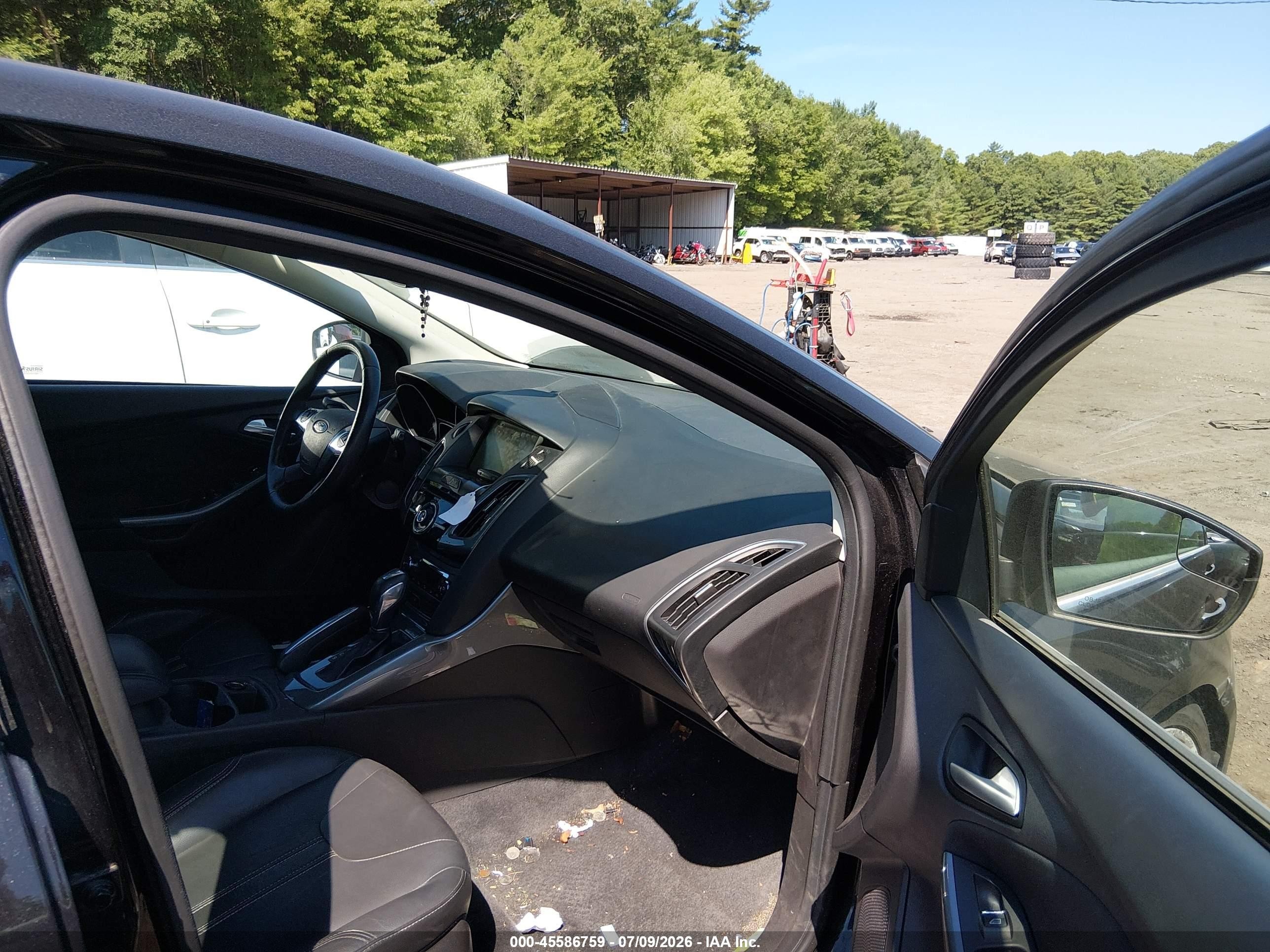 2012 Ford Focus Titanium Black vin: 1FAHP3N29CL101590