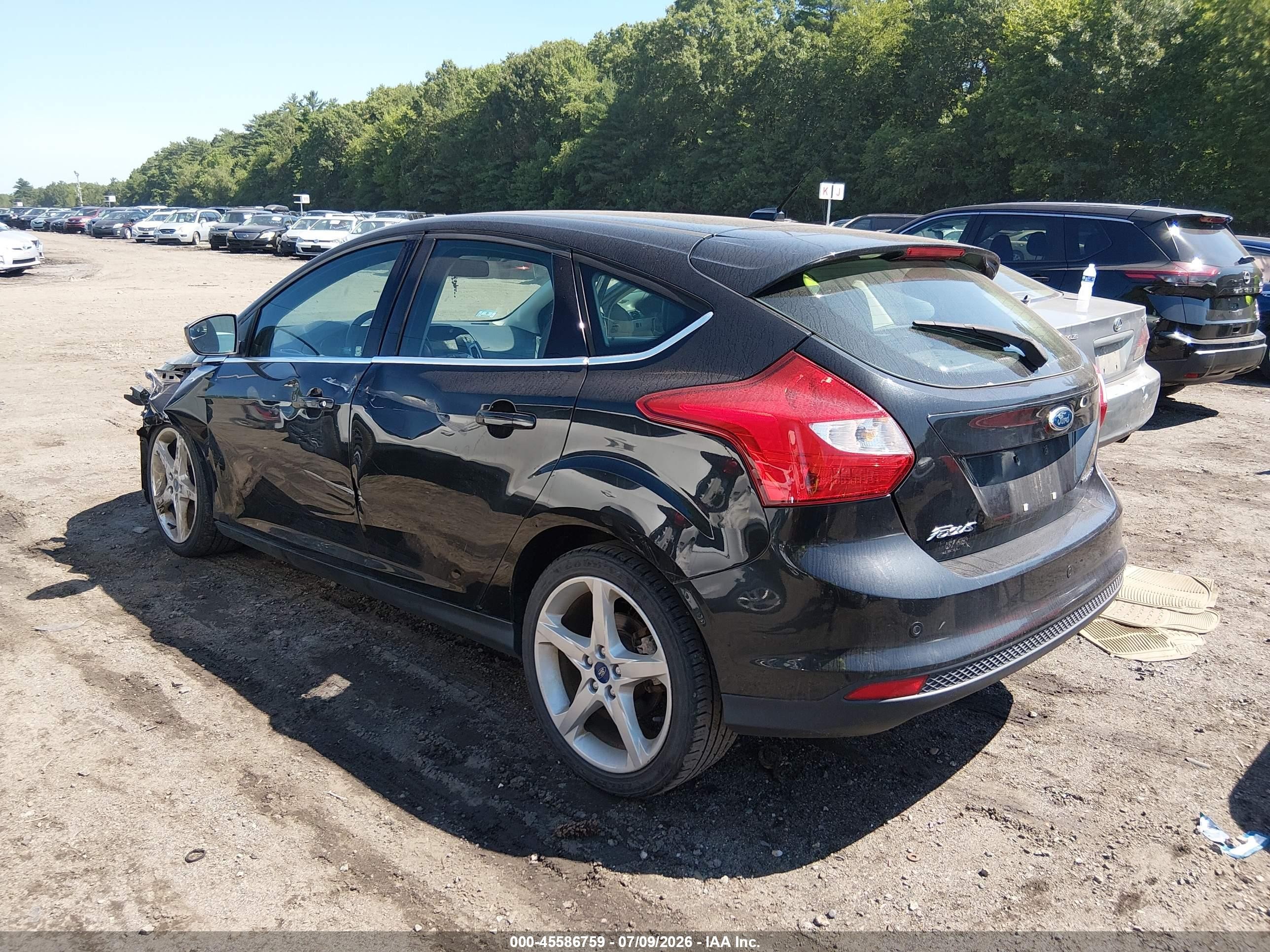 2012 Ford Focus Titanium Black vin: 1FAHP3N29CL101590
