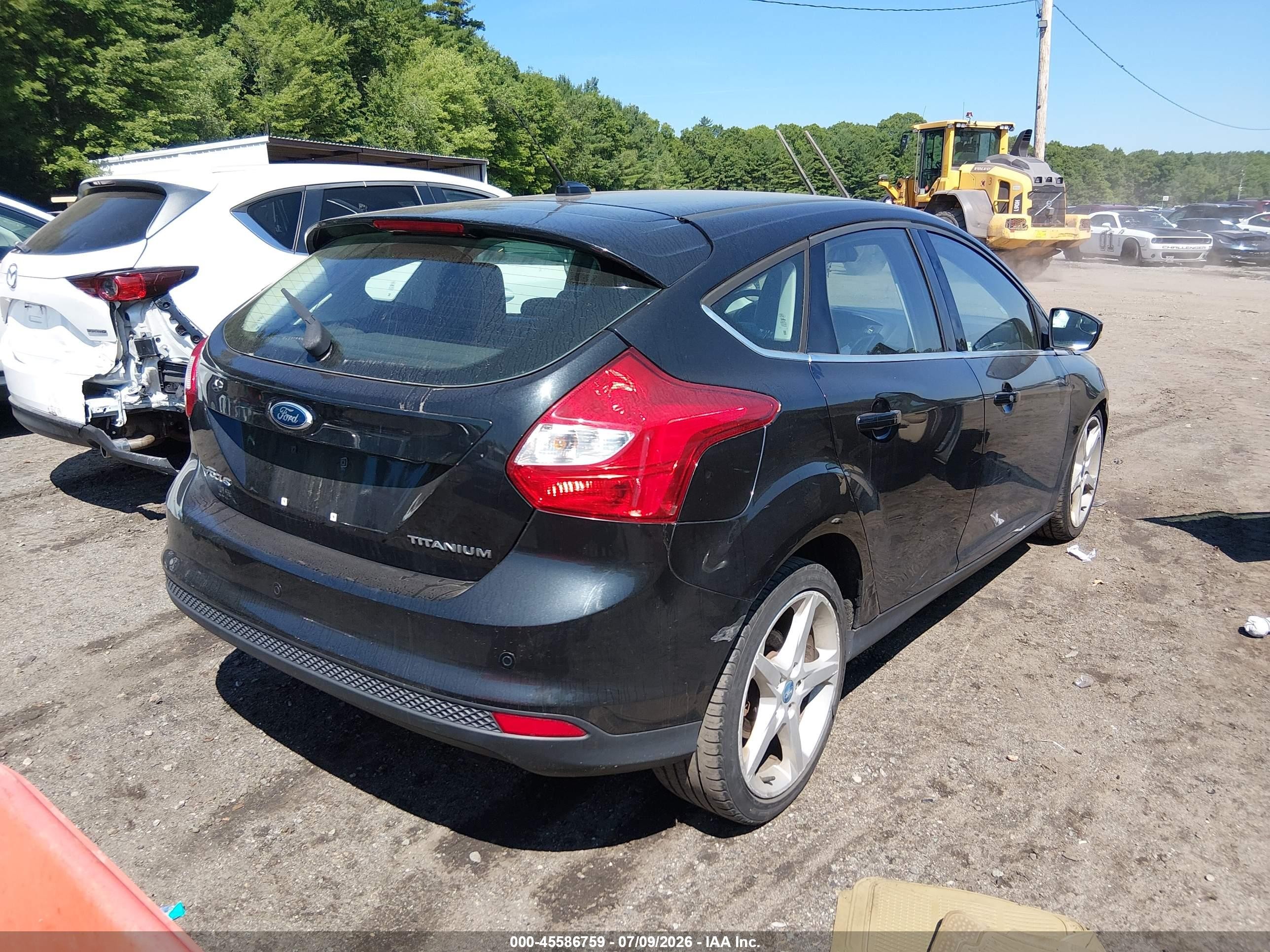 2012 Ford Focus Titanium Black vin: 1FAHP3N29CL101590