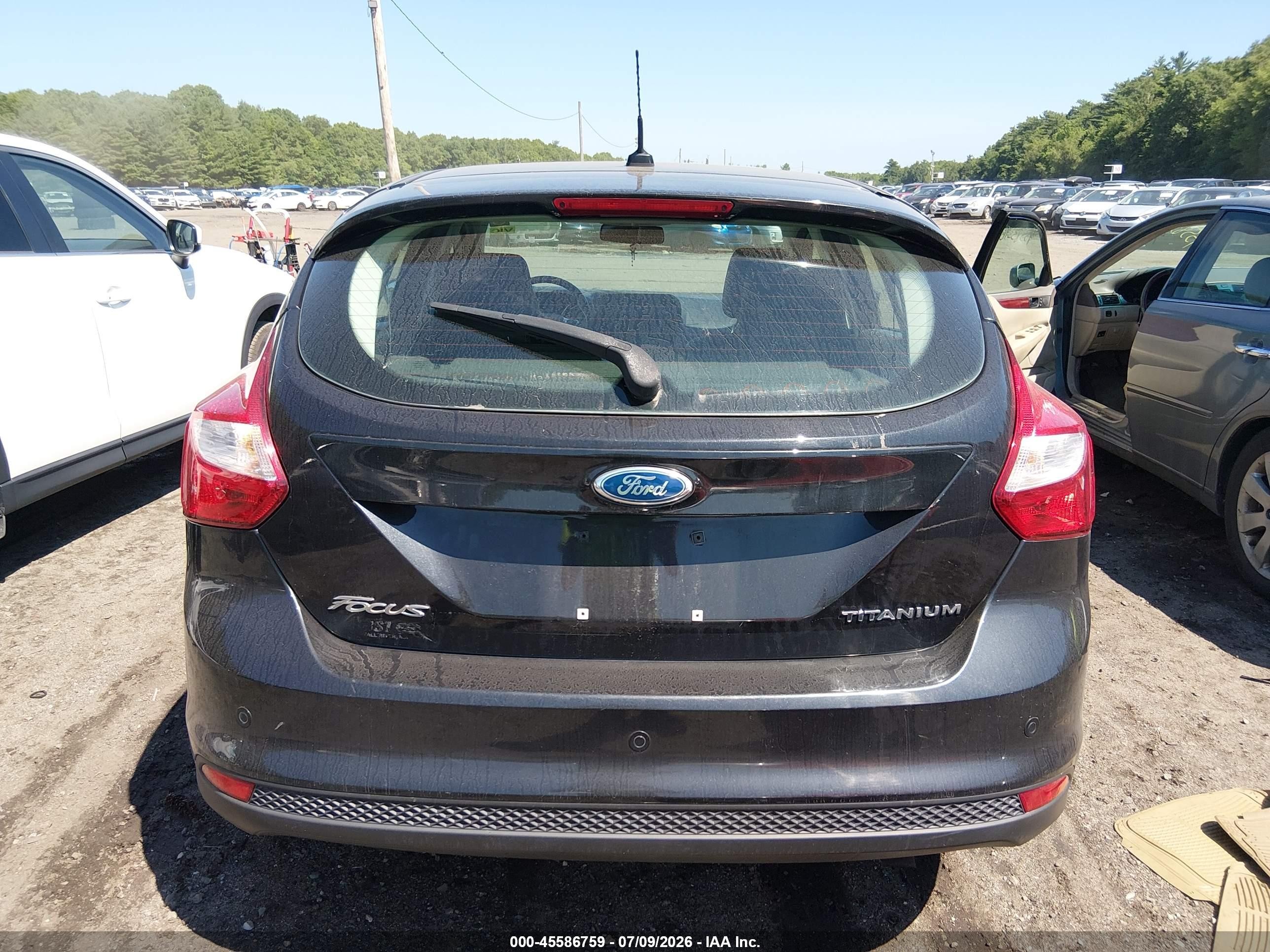 2012 Ford Focus Titanium Black vin: 1FAHP3N29CL101590