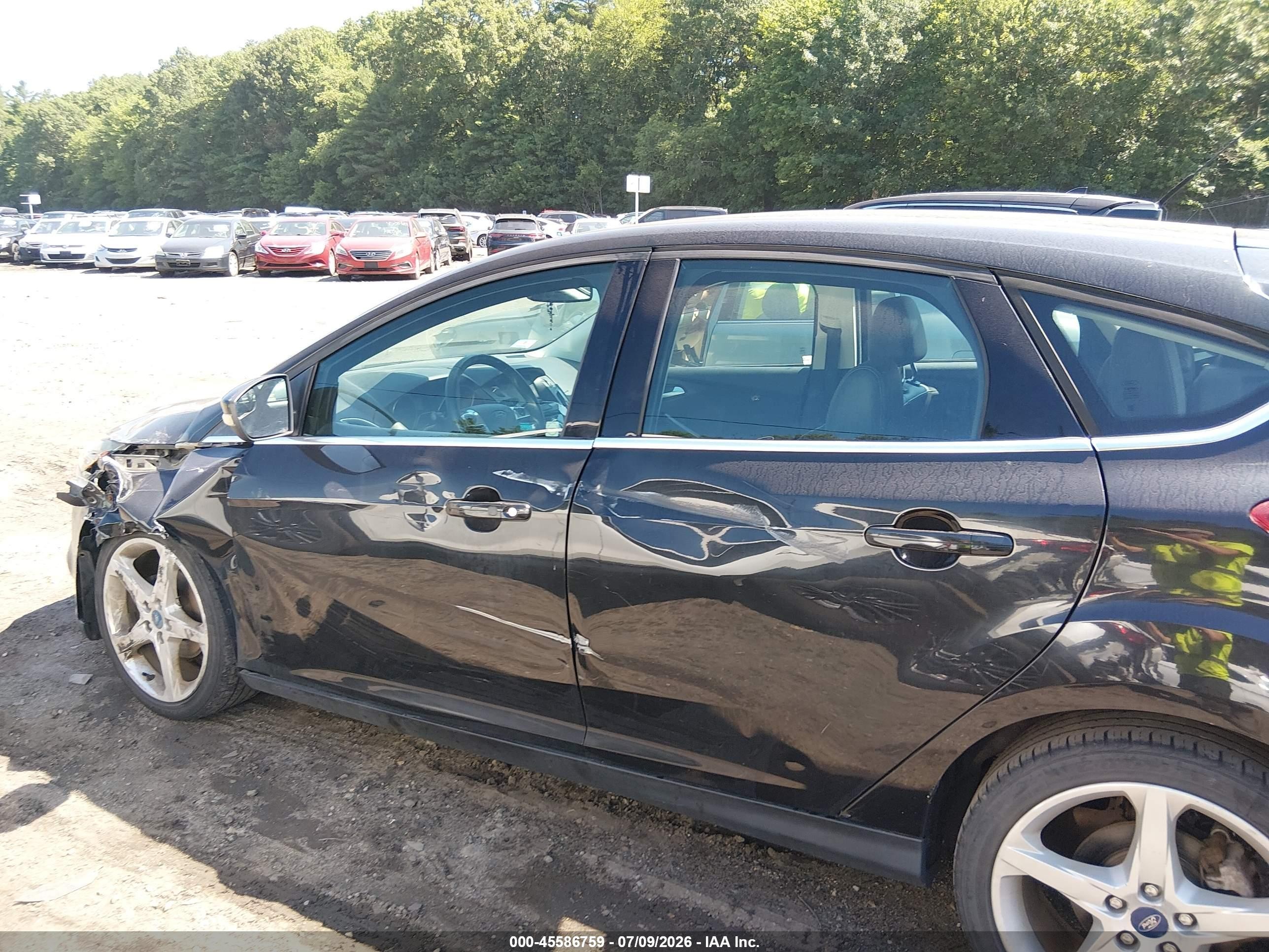 2012 Ford Focus Titanium Black vin: 1FAHP3N29CL101590