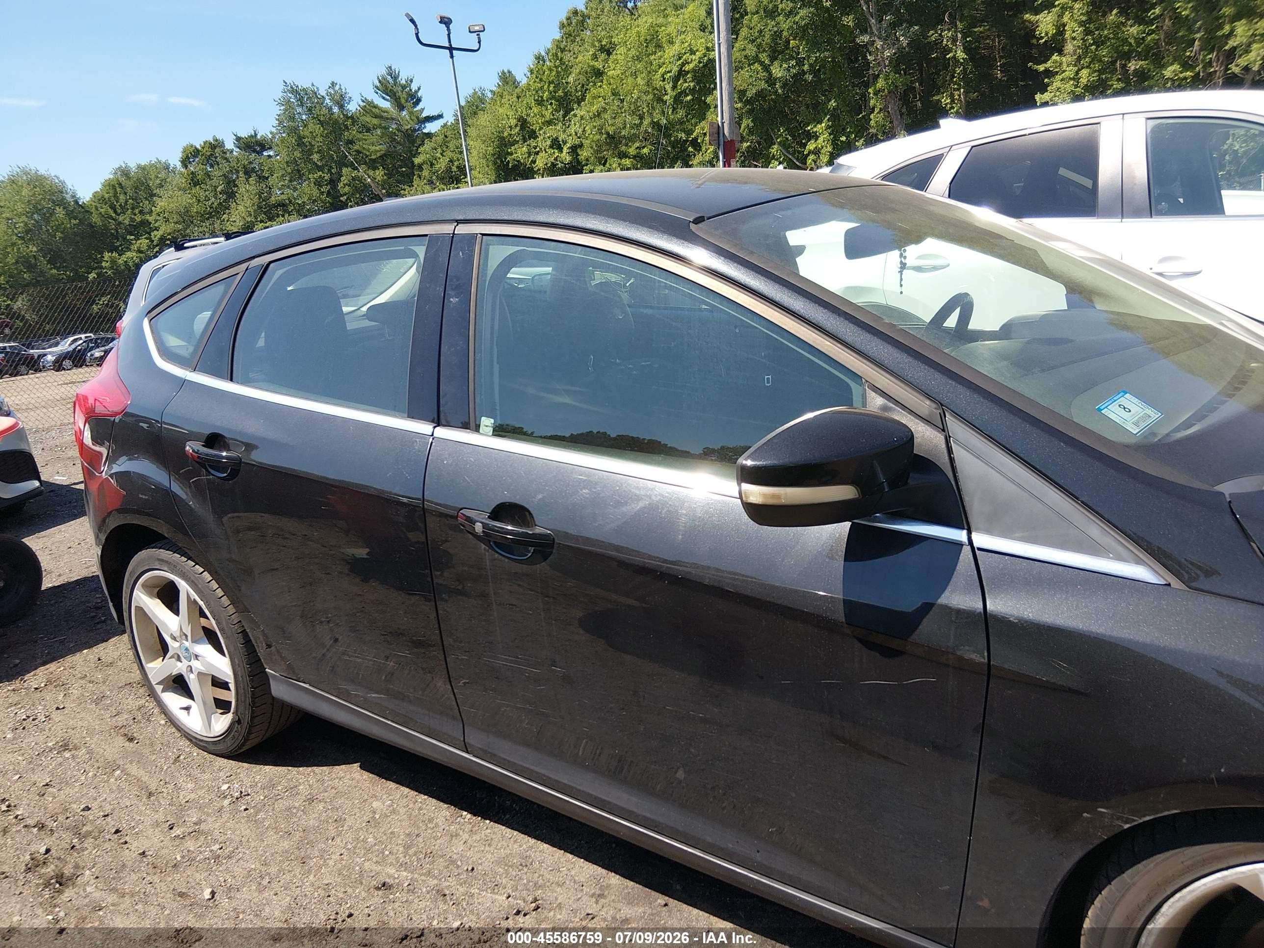 2012 Ford Focus Titanium Black vin: 1FAHP3N29CL101590