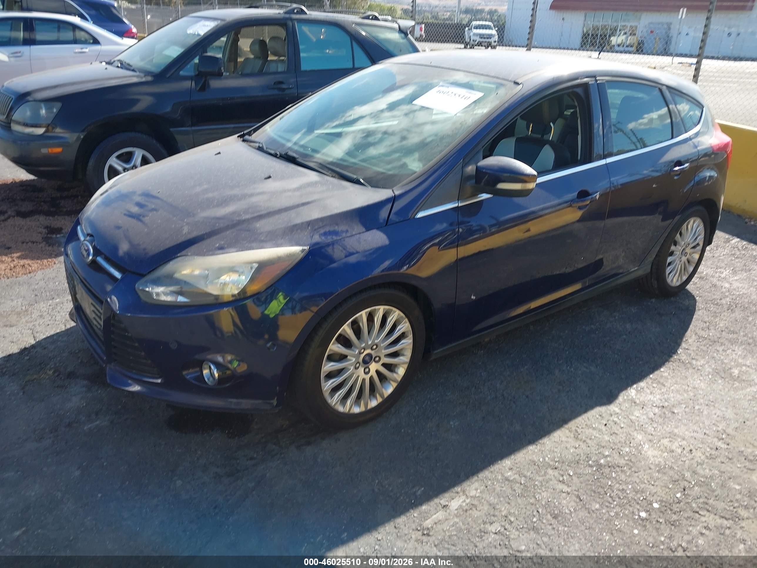 2012 Ford Focus Titanium Blue vin: 1FAHP3N29CL131110