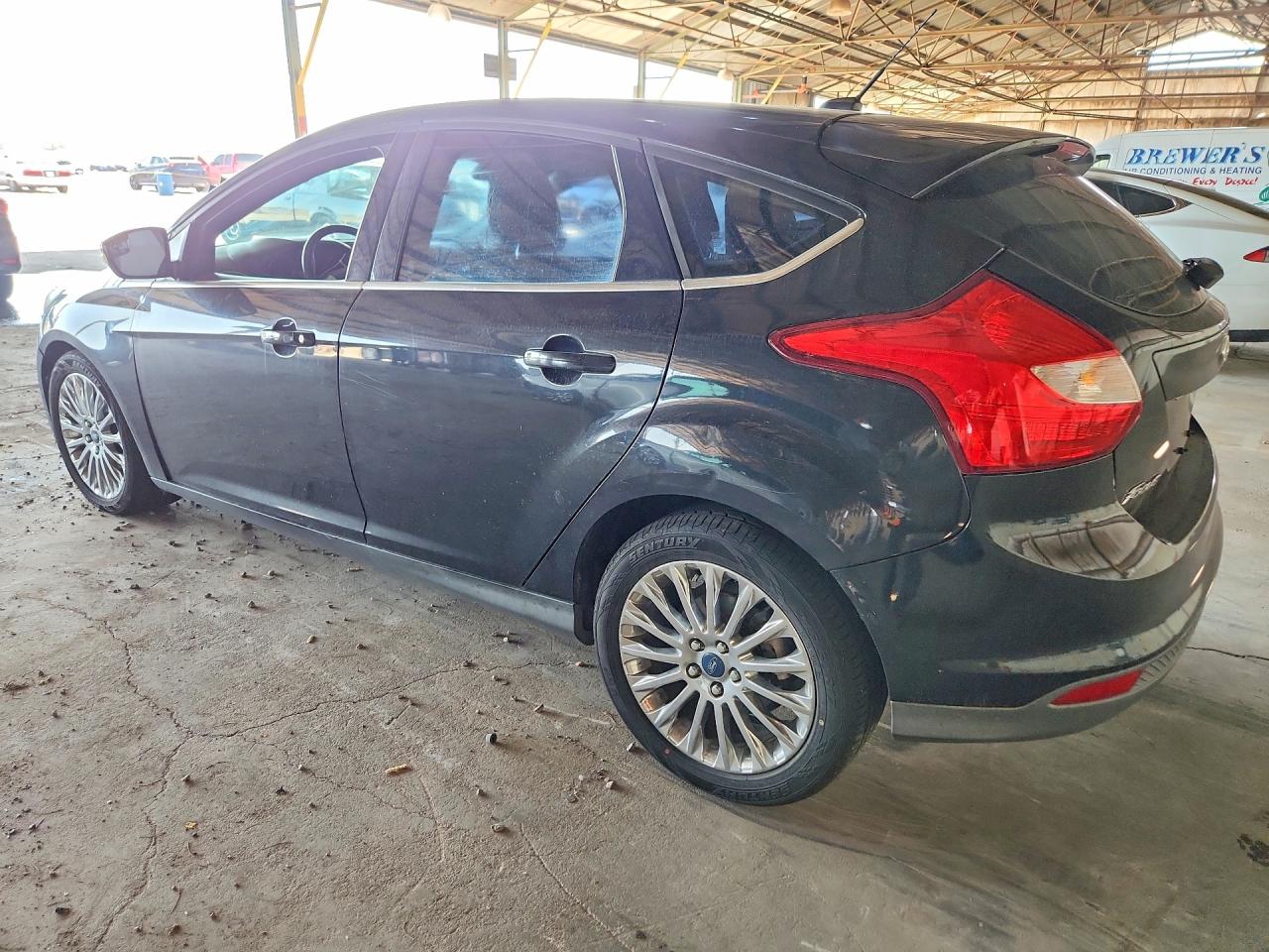 2012 Ford Focus Titanium Black vin: 1FAHP3N29CL347877