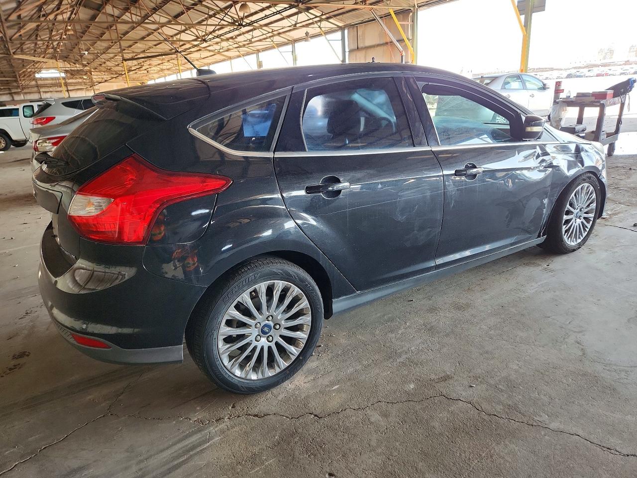 2012 Ford Focus Titanium Black vin: 1FAHP3N29CL347877