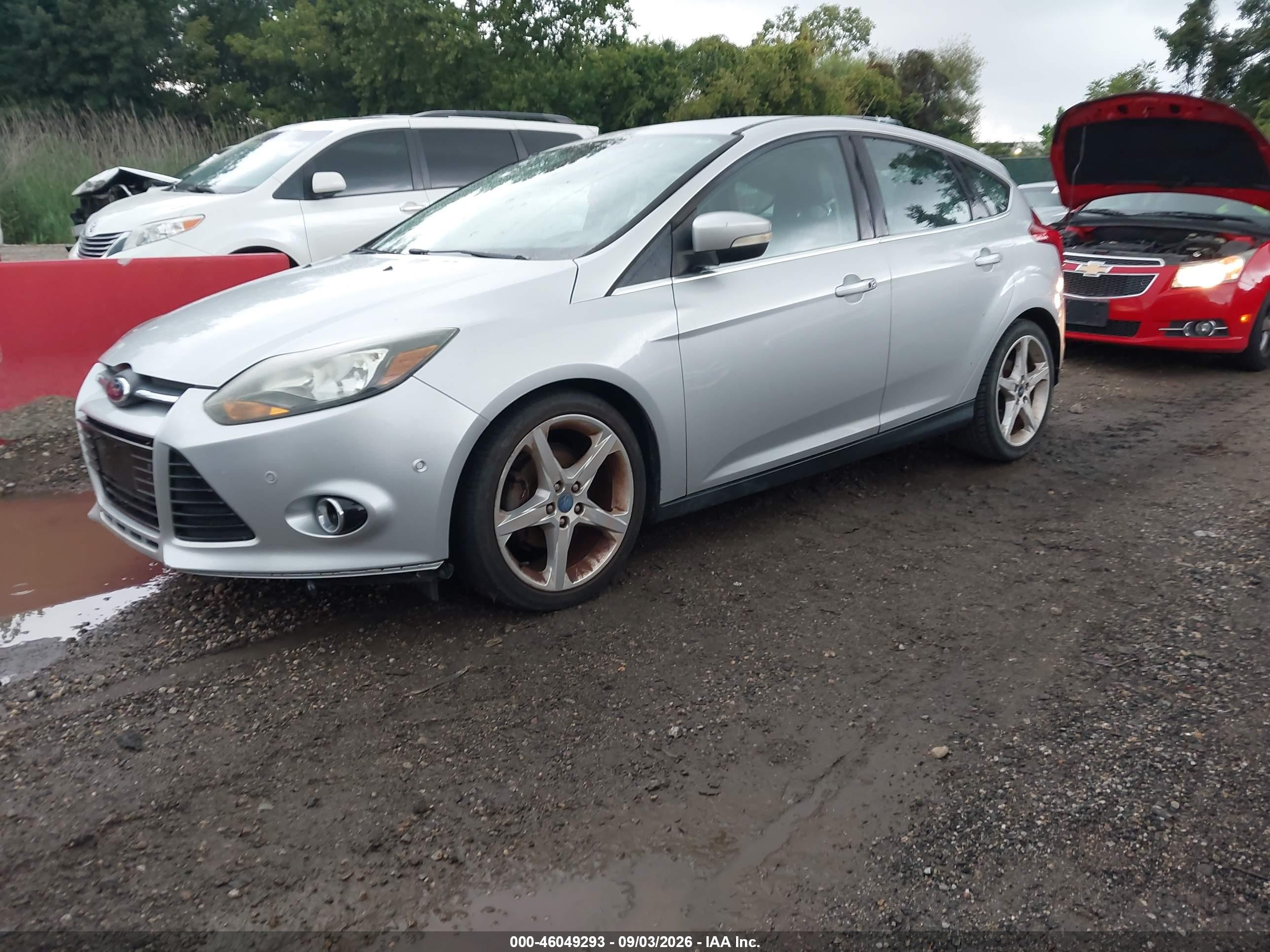 2012 Ford Focus Titanium Серебряный vin: 1FAHP3N2XCL298835