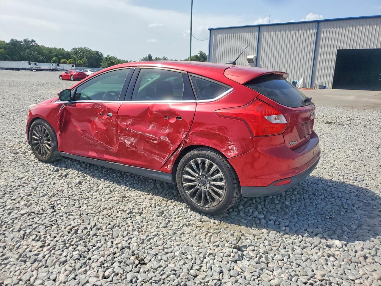 2012 Ford Focus Titanium Red vin: 1FAHP3N2XCL365790
