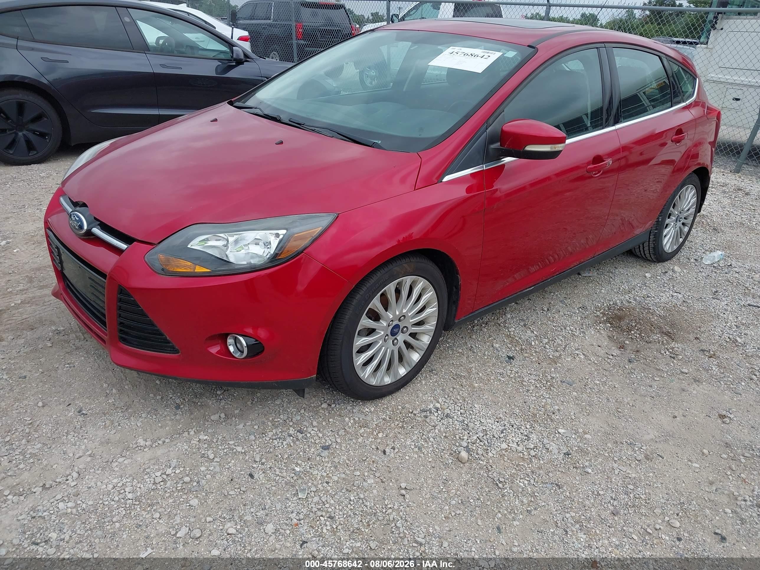 2012 Ford Focus Titanium Red vin: 1FAHP3N2XCL463590