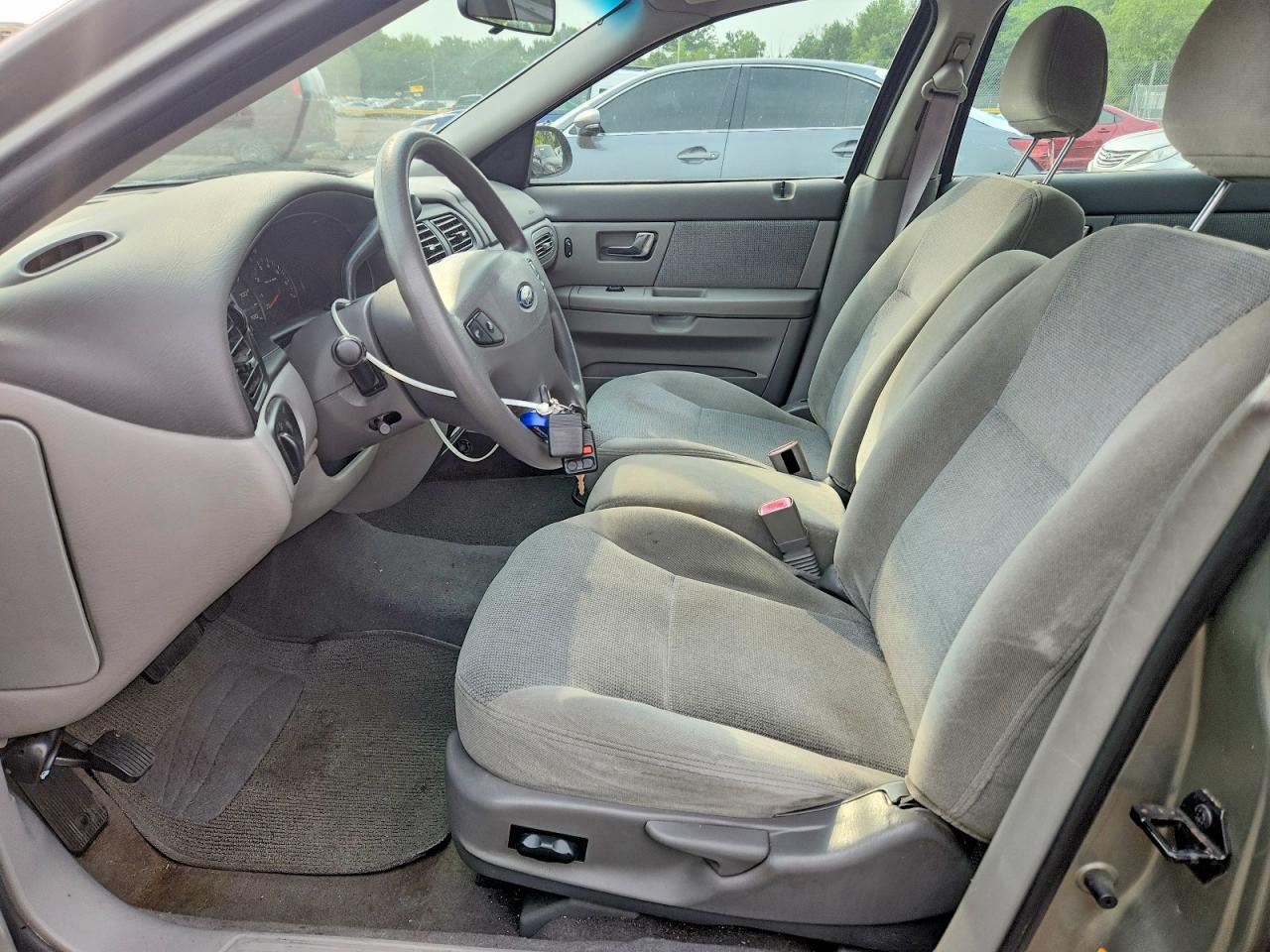 2002 Ford Taurus Se Tan vin: 1FAHP53U42G194901