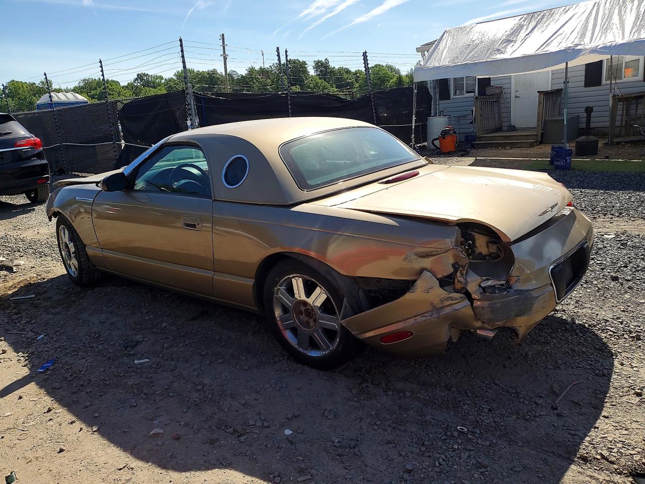 2005 Ford Thunderbird Gold vin: 1FAHP60A05Y103198