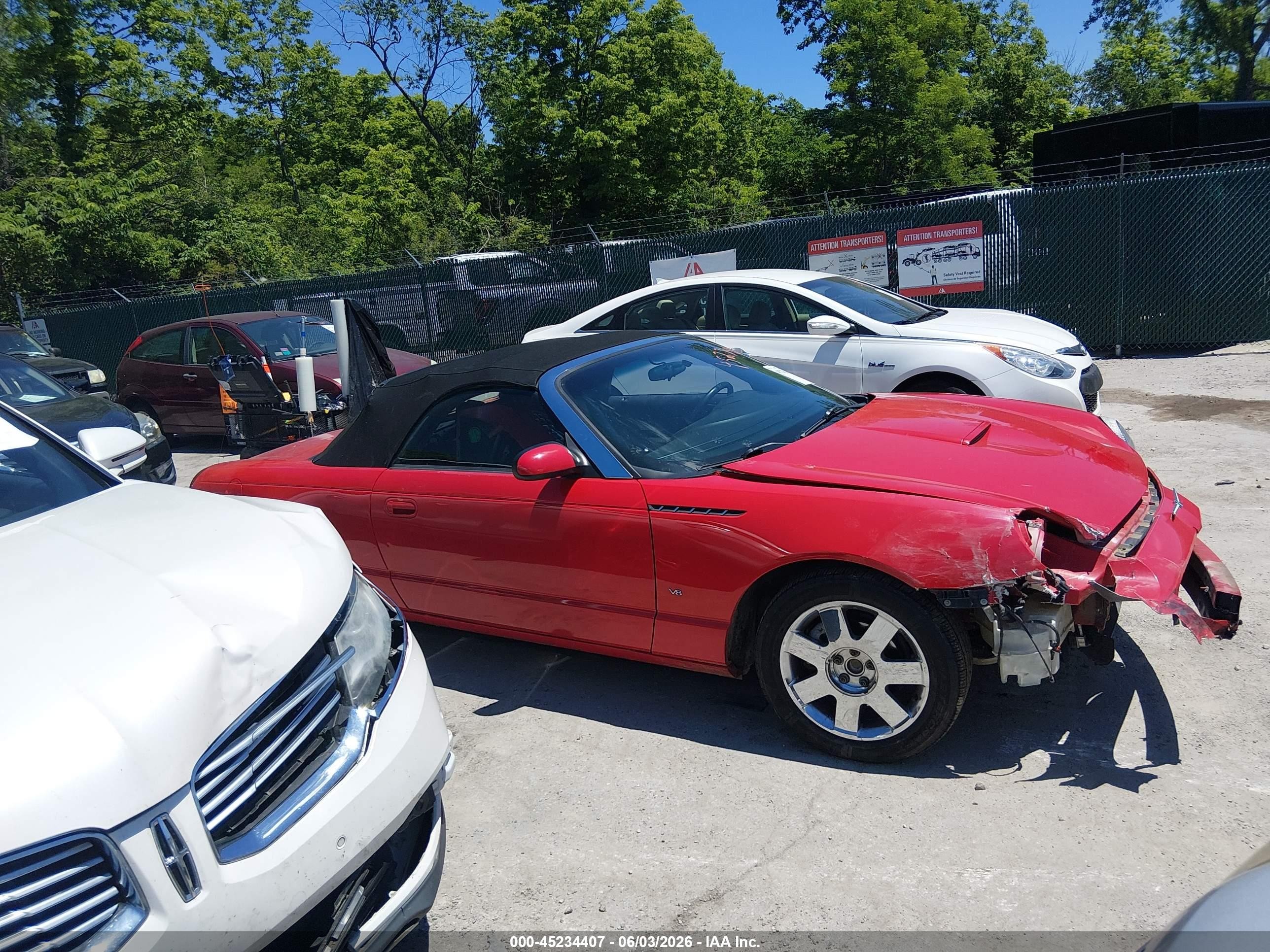 2003 Ford Thunderbird   Red vin: 1FAHP60A23Y101644