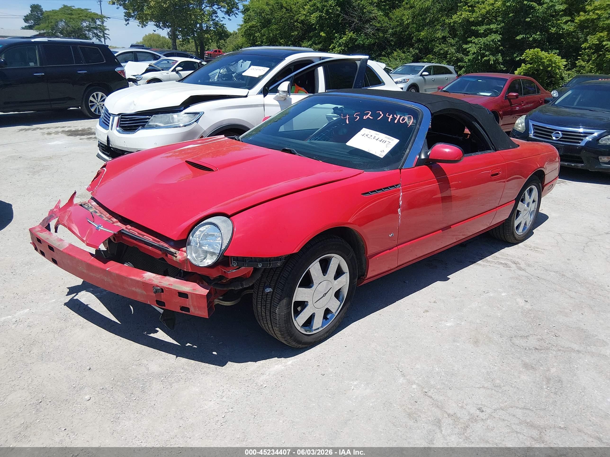 2003 Ford Thunderbird   Red vin: 1FAHP60A23Y101644