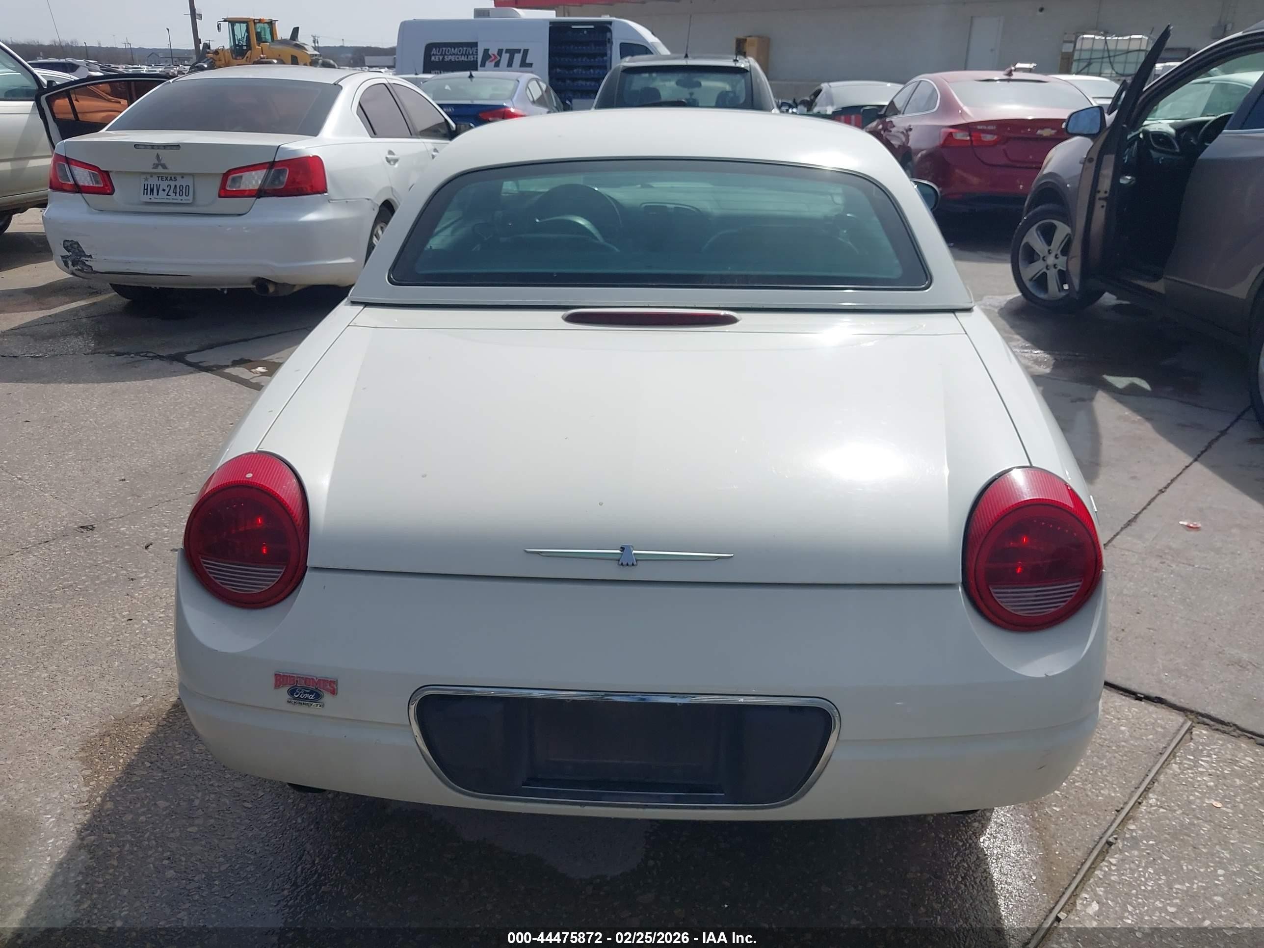 2002 Ford Thunderbird   White vin: 1FAHP60A62Y126433
