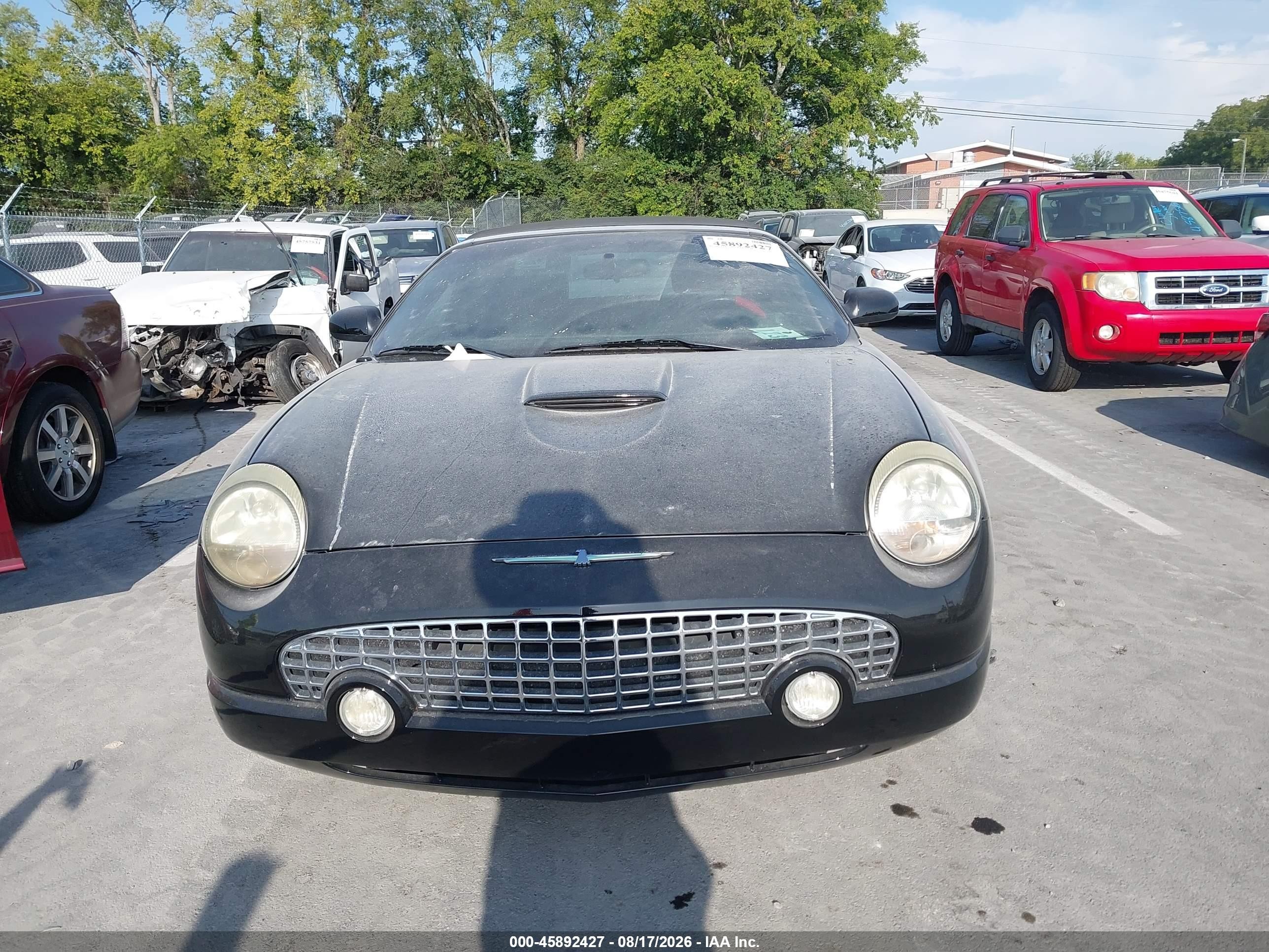 2002 Ford Thunderbird Deluxe/premium/w/hardtop Deluxe/w/hardtop Premium Black vin: 1FAHP60A72Y101704