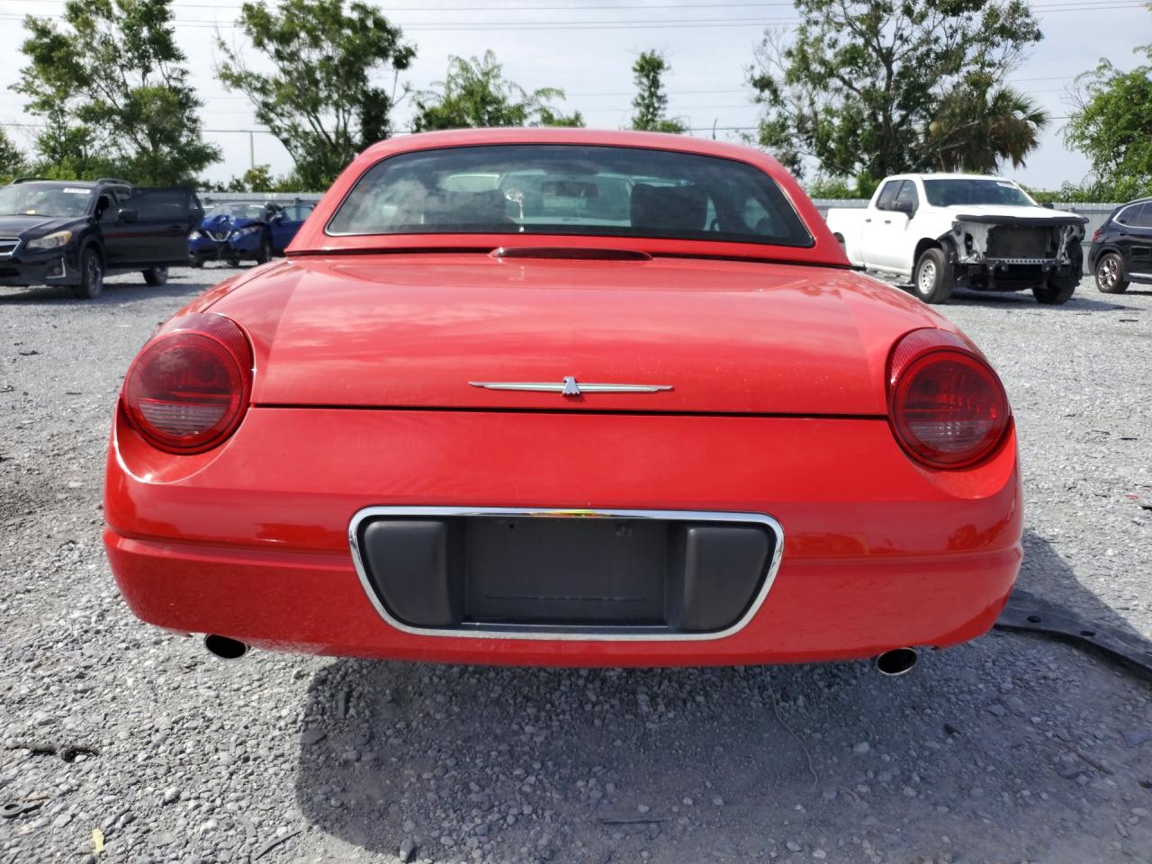 2004 Ford Thunderbird Red vin: 1FAHP60A74Y101463