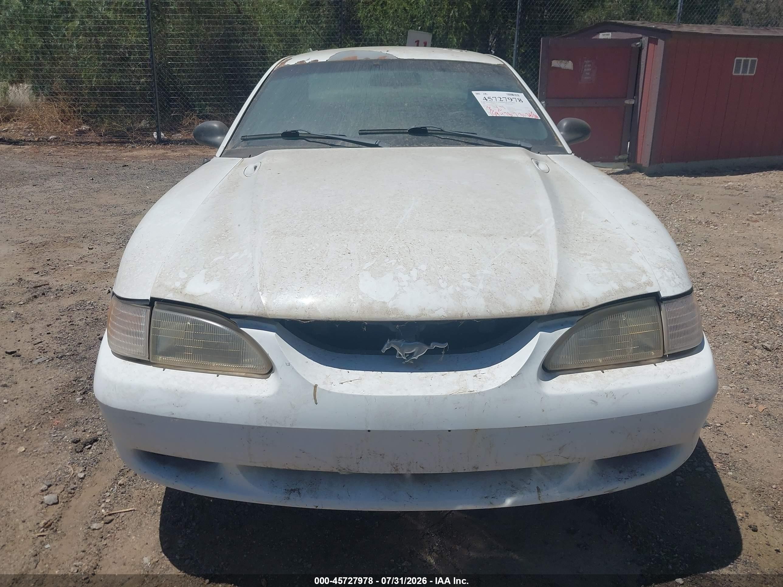 1997 Ford Mustang   White vin: 1FALP4046VF140549