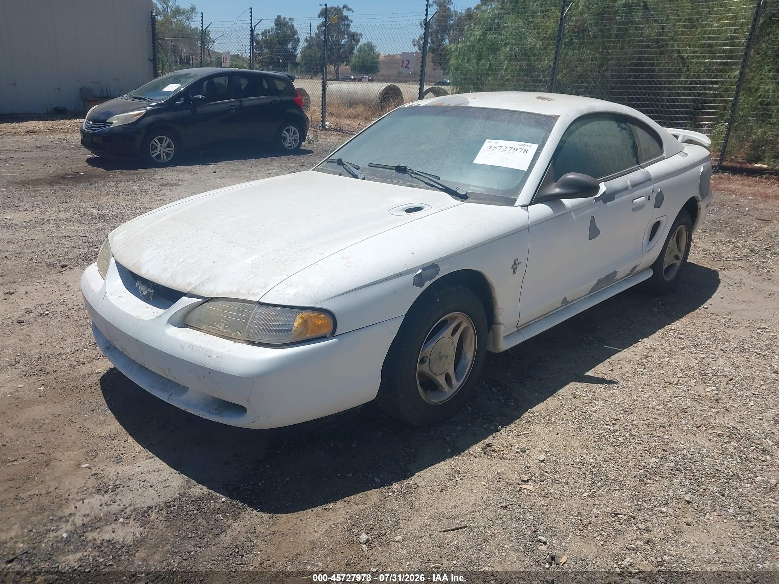 1997 Ford Mustang   White vin: 1FALP4046VF140549