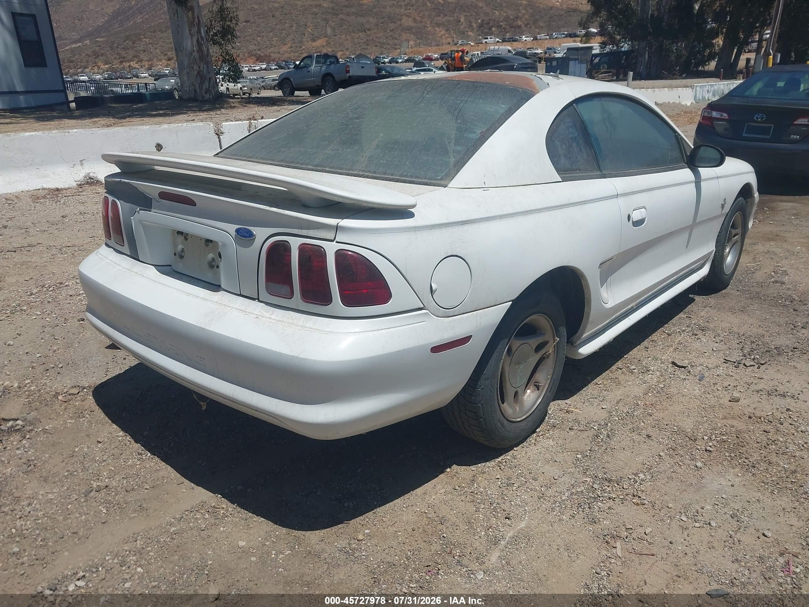 1997 Ford Mustang   White vin: 1FALP4046VF140549