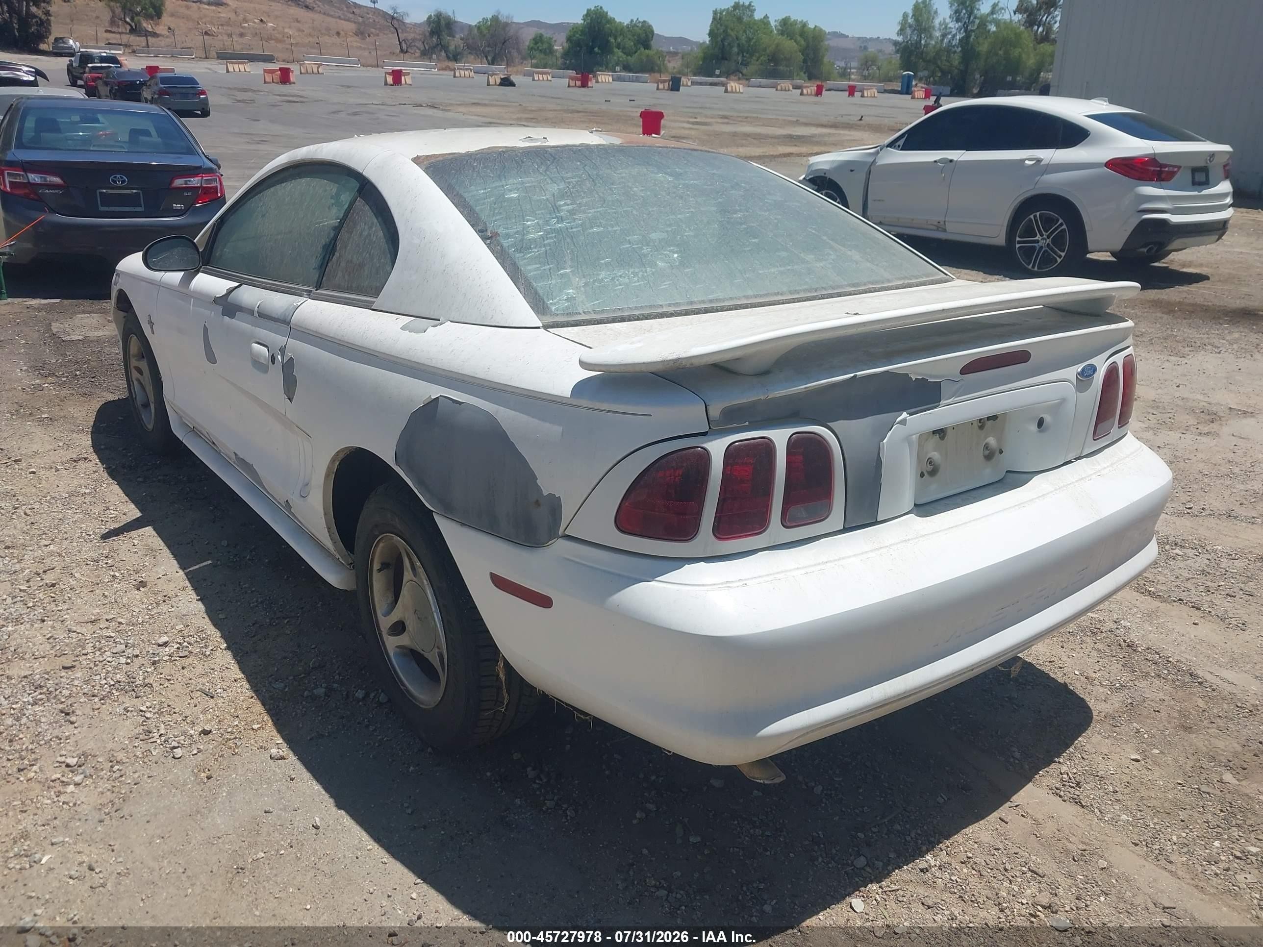 1997 Ford Mustang   White vin: 1FALP4046VF140549