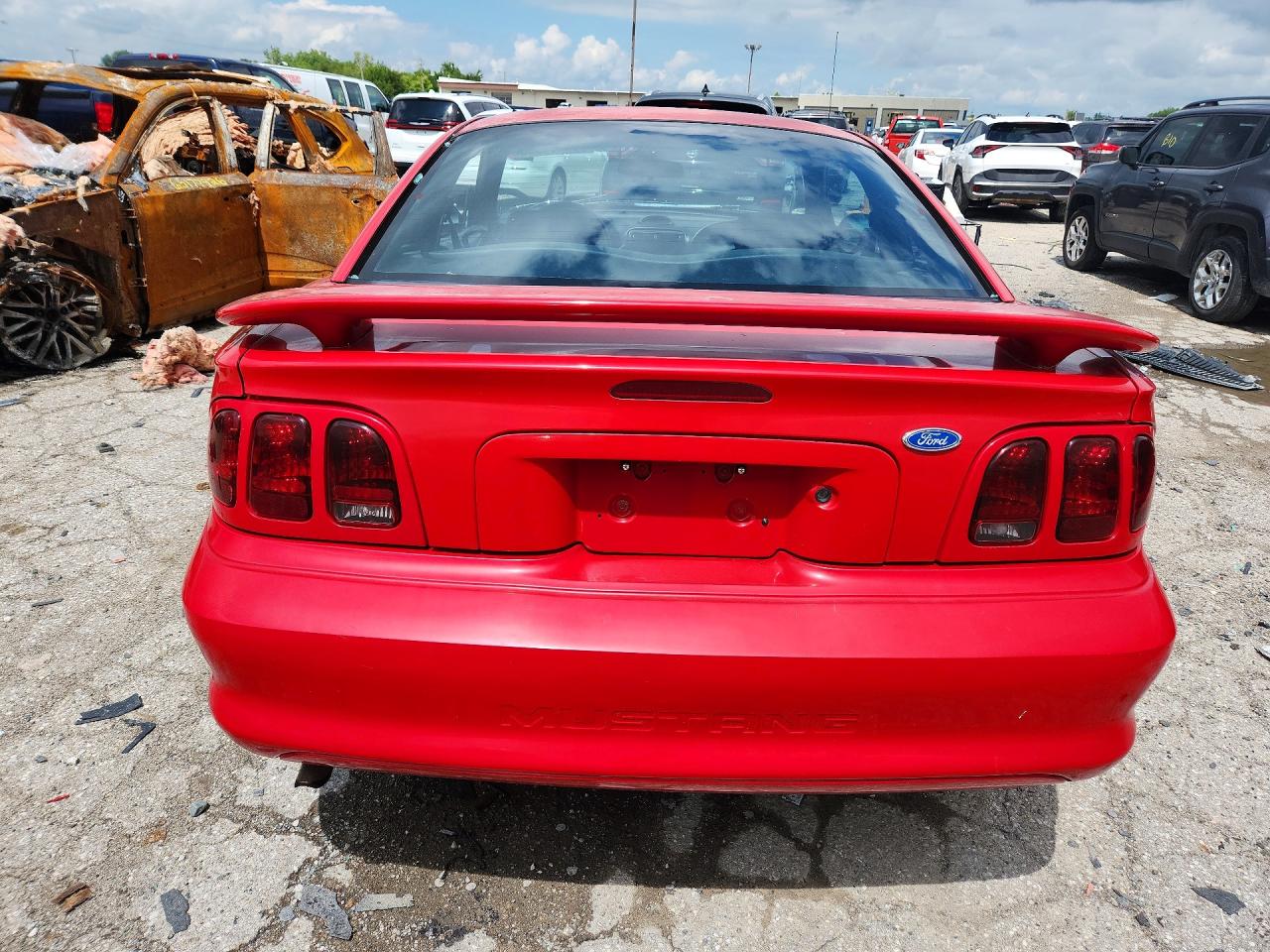 1997 Ford Mustang Red vin: 1FALP4047VF128877
