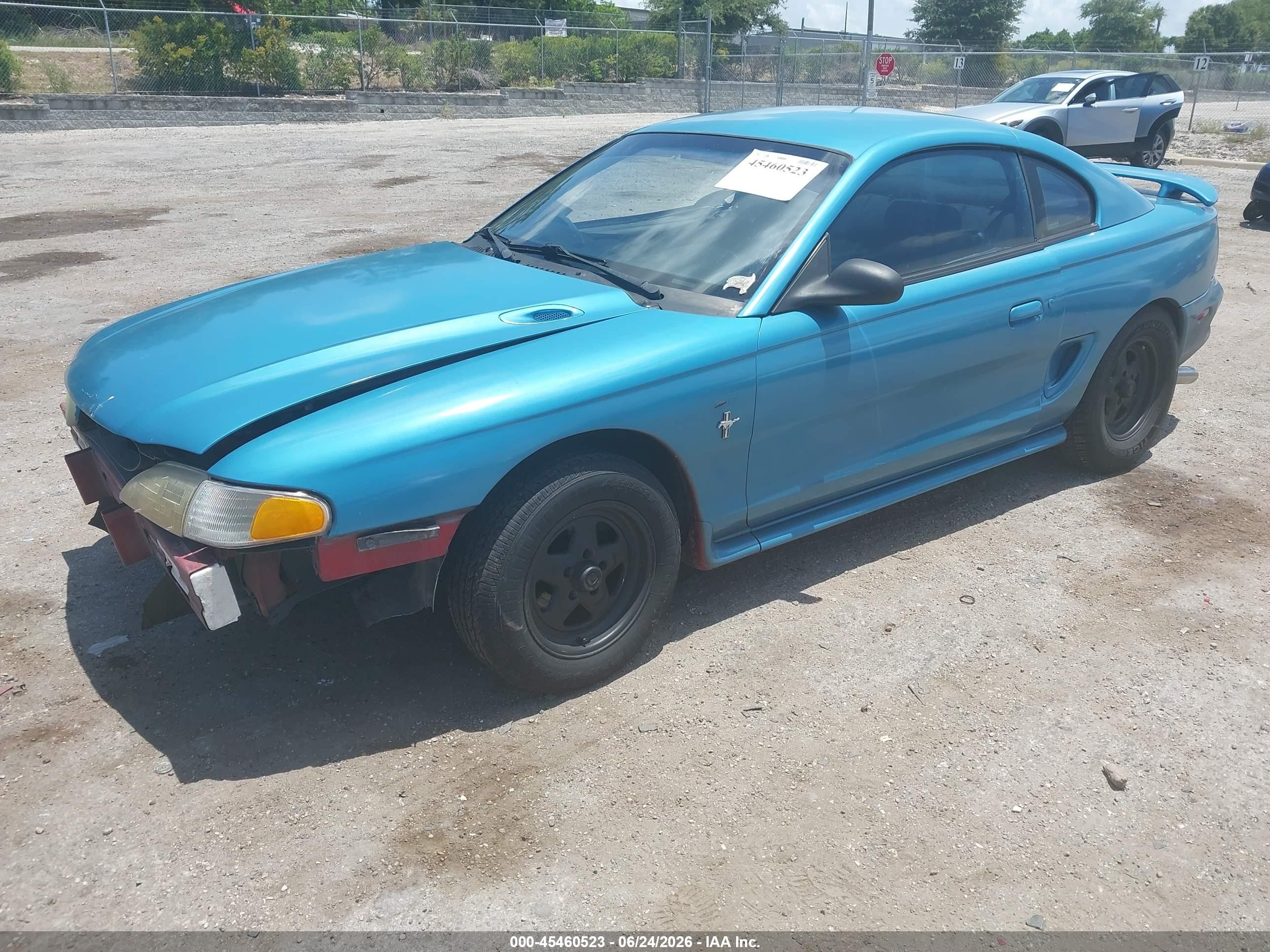 1997 Ford Mustang   Синий vin: 1FALP404XVF204513