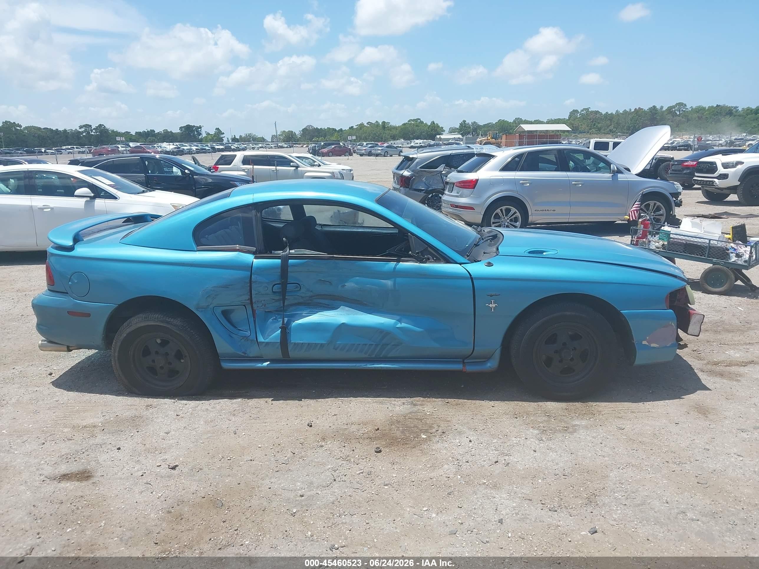 1997 Ford Mustang   Синий vin: 1FALP404XVF204513
