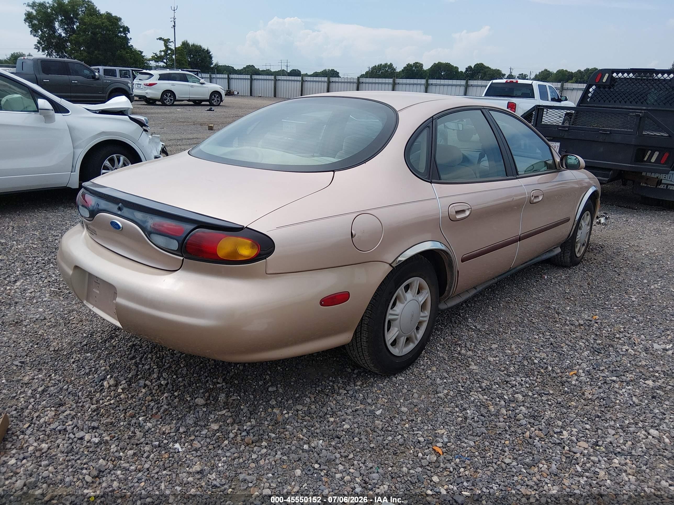 1997 Ford Taurus Gl Золотой vin: 1FALP52U2VA265421