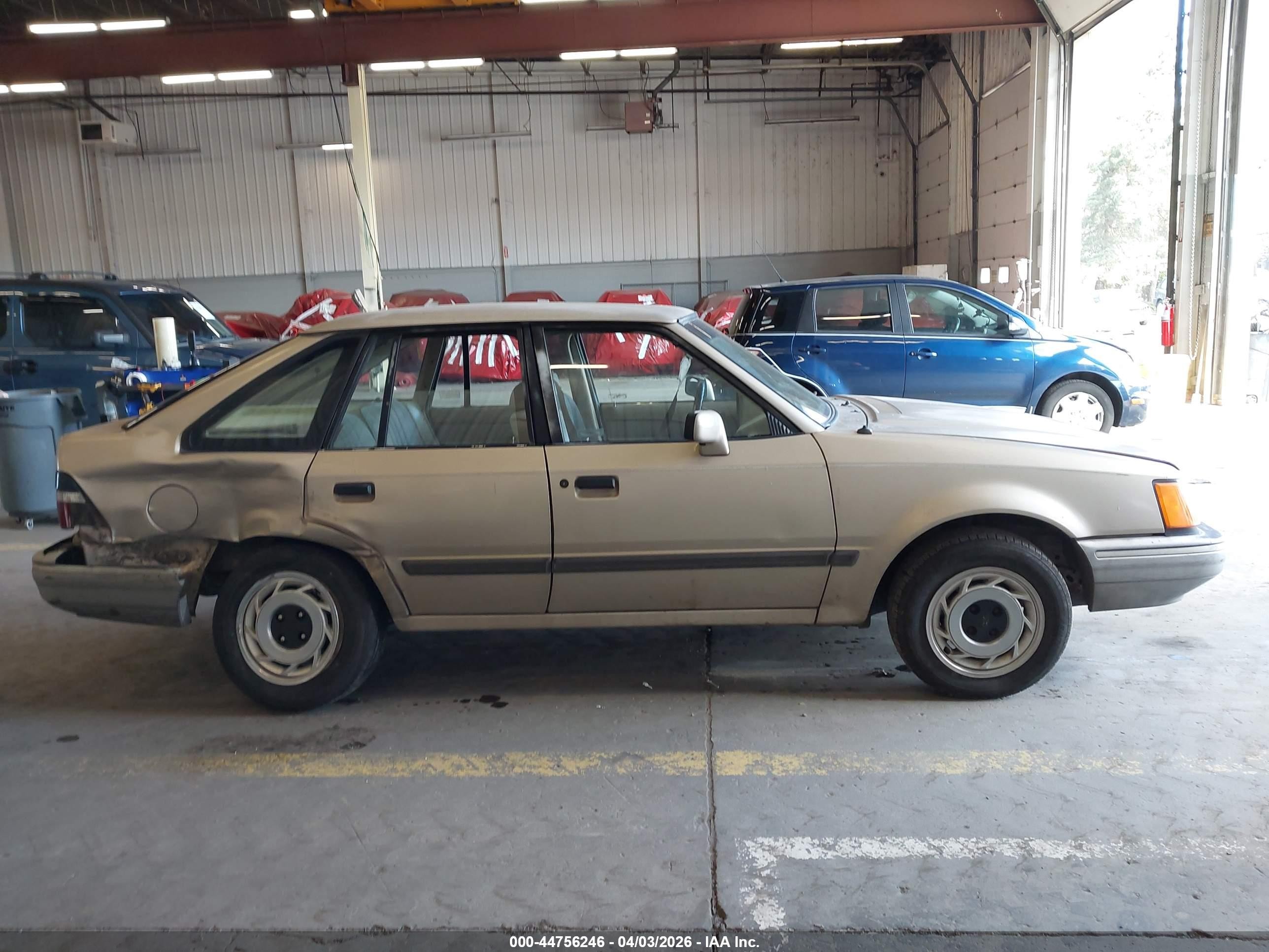 1989 Ford Escort Lx Бежевый vin: 1FAPP9590KW331222