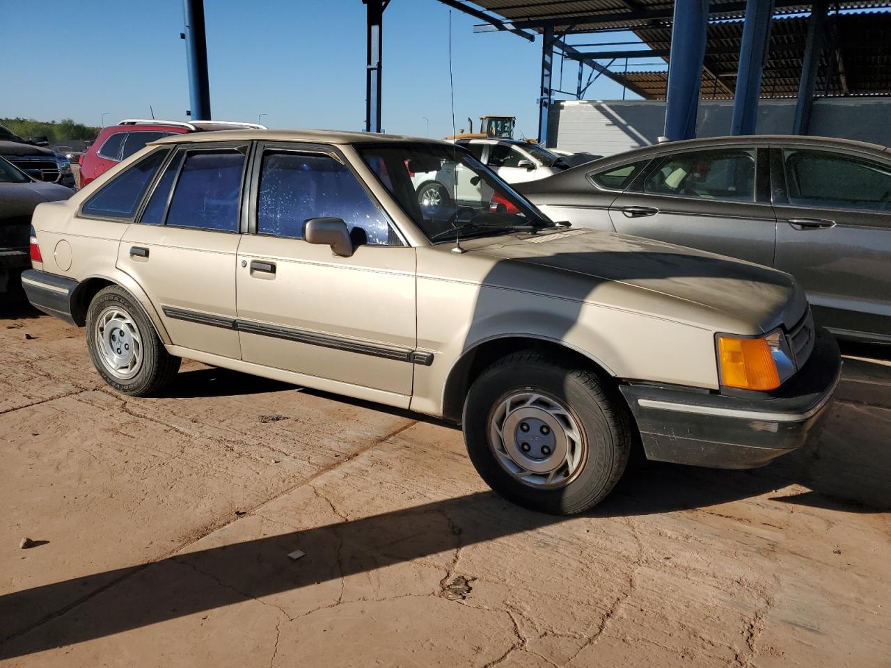 1989 Ford Escort Lx Tan vin: 1FAPP9597KW118042
