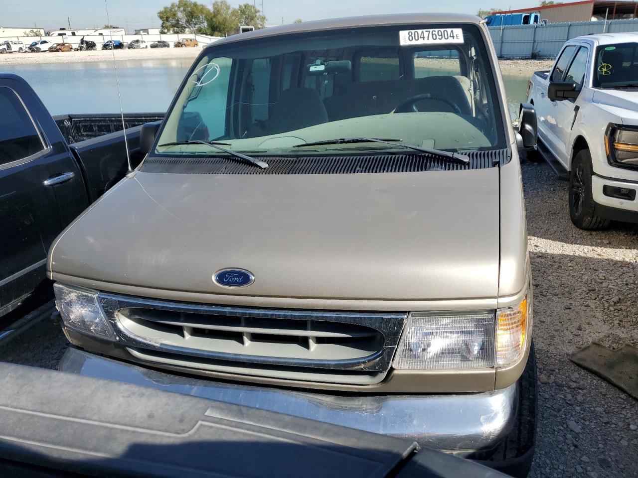 1999 Ford Econoline E350 Super Duty Wagon Tan vin: 1FBNE31S9XHB82919