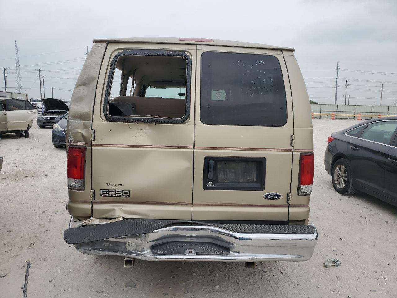 1999 Ford Econoline E350 Super Duty Wagon Tan vin: 1FBNE31S9XHB82919
