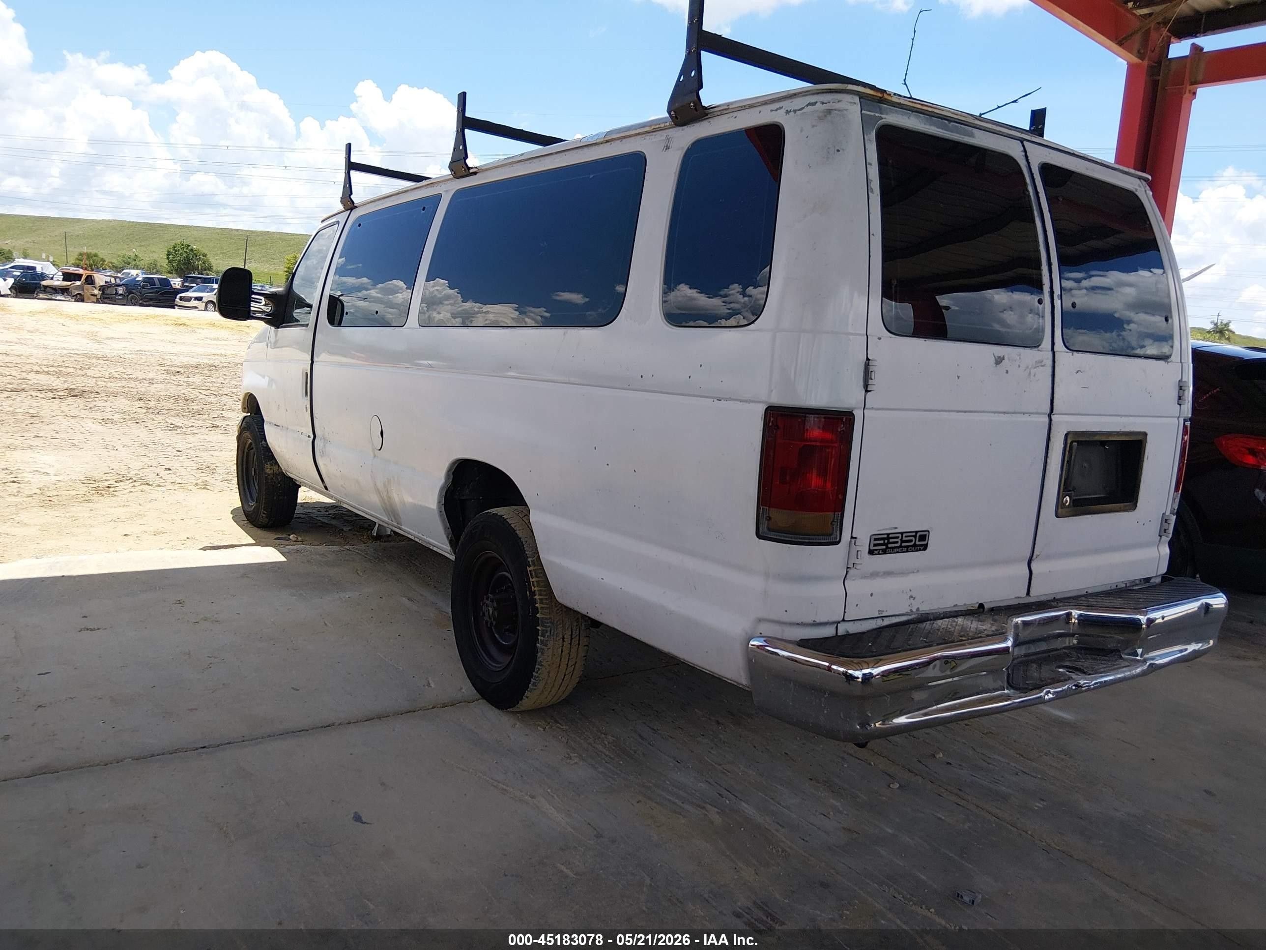 2001 Ford E-350 Super Duty   White vin: 1FBSS31L41HA41493